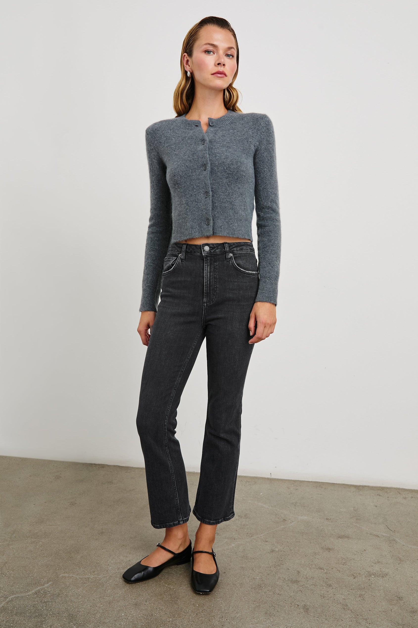 Sunset Crop Slim Fare Jeans with Belt Loops, Two Front Pockets plus a Coin Pocket and Two Back Patch Pockets in Black Pearl Colorway - Front Full Body View Featured on Model