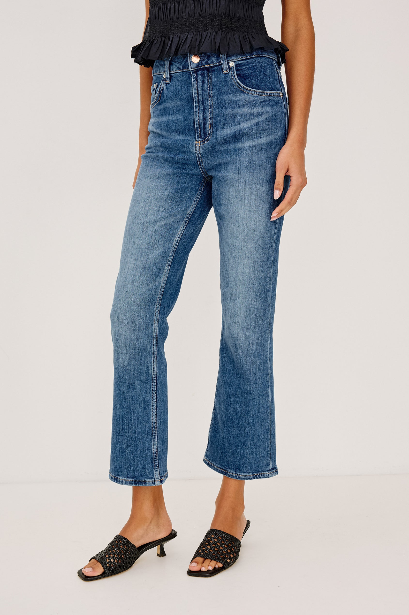 Sunset Crop Slim Flare Jean in Light Stretch Denim With High-Waisted Fit and Zip Fly in Tidal Wavey Colorway - Lower Body Front View Featured on Model