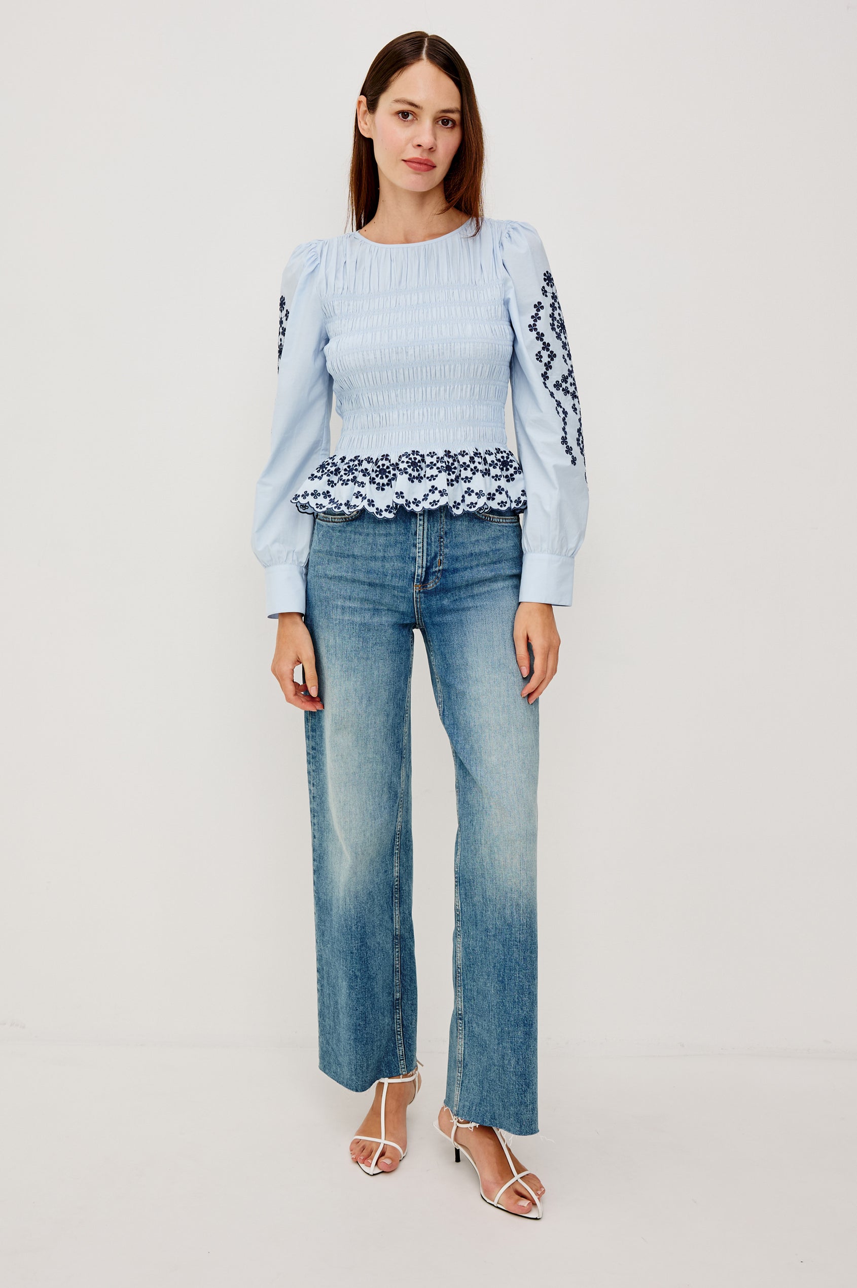 Tabi Blouse Top in Poplin With Smocked Body, Long Puff Sleeves With Fitted Cuffs, Contrast Embroidered Detailing, and Back Keyhole Cutout in Blue Bird Colorway - Full Body Front View Featured on Model
