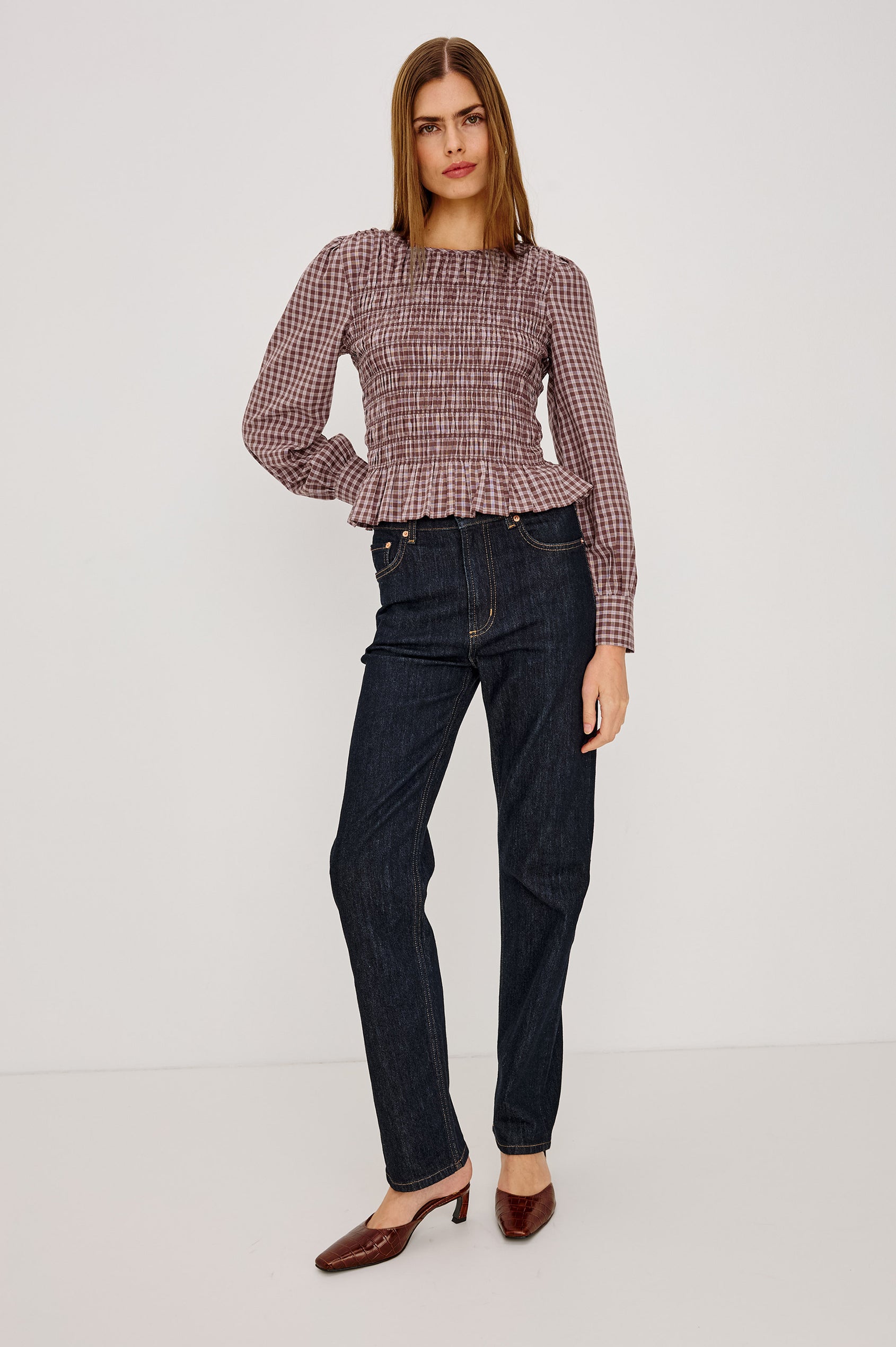 Tabi Shirt in Cotton Poplin With Fitted Smocked Bodice, Flared Peplum Hem, Long Puff Sleeves, and Shirred Neckline in Rust Rose Colorway - Full Body Front View Featured on Model
