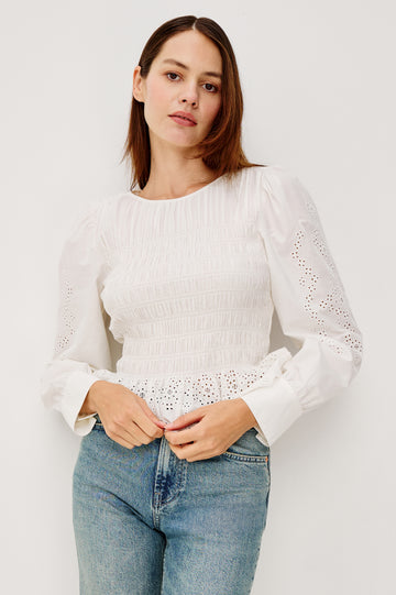 Tabi Blouse Top in Poplin With Smocked Body, Long Puff Sleeves With Fitted Cuffs, Embroidered Detailing, and Back Keyhole Cutout in White Embroidery Colorway - Upper Body Front View Featured on Model