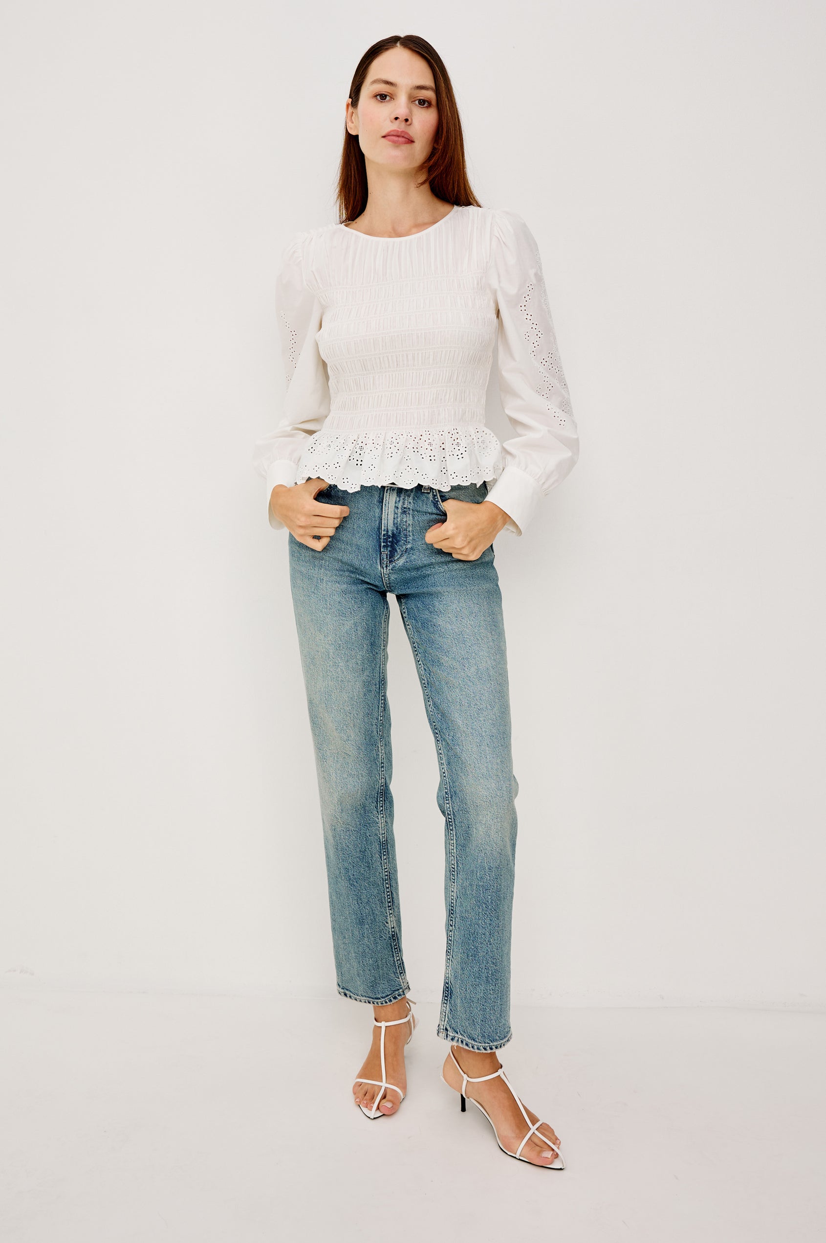 Tabi Blouse Top in Poplin With Smocked Body, Long Puff Sleeves With Fitted Cuffs, Embroidered Detailing, and Back Keyhole Cutout in White Embroidery Colorway - Front Full Body View Featured on Model