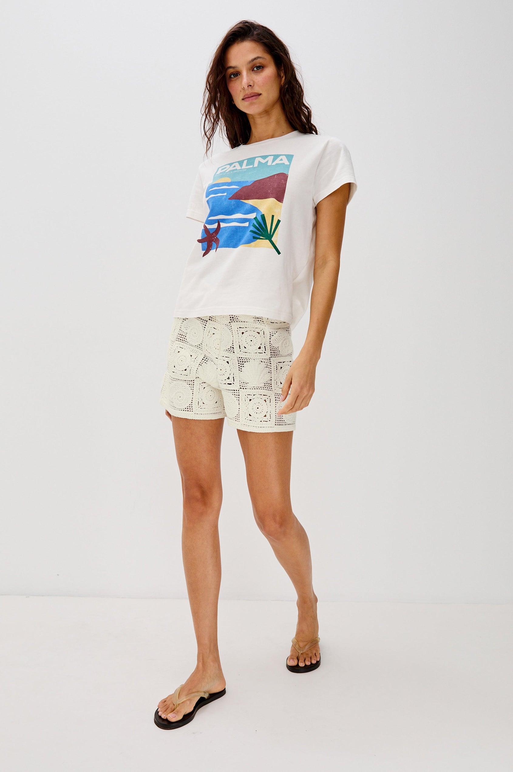 The Classic Crew Neck T-Shirt with Short Sleeves, Relaxed Fit, White Body in Palma Screen Print Colorway. Full Body Front View Shown on Model.