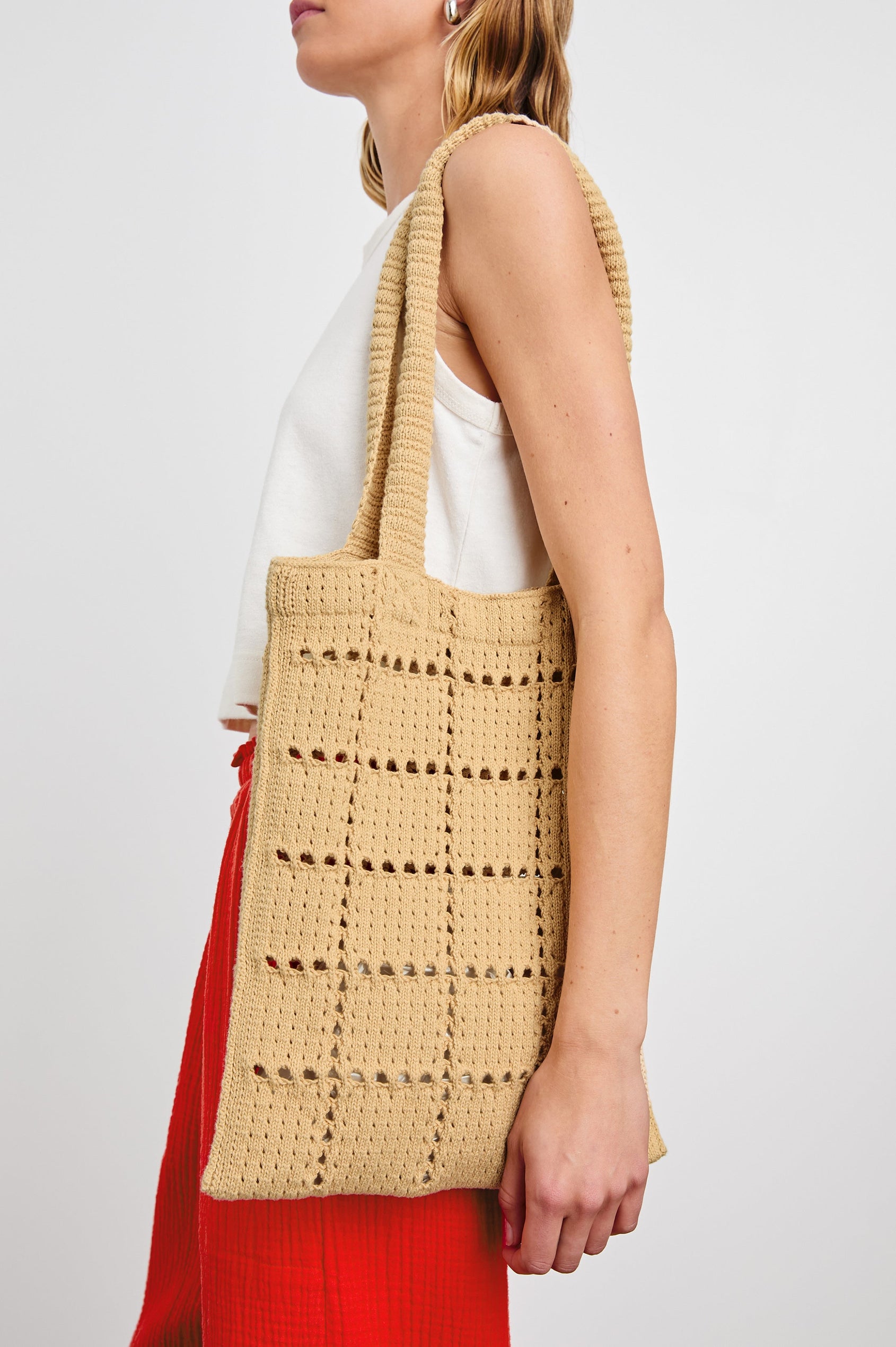 Crochet Rectangular Tote with Patchwork Grid Drop stiches in Rattan Colorway  - Side View Featured on Model