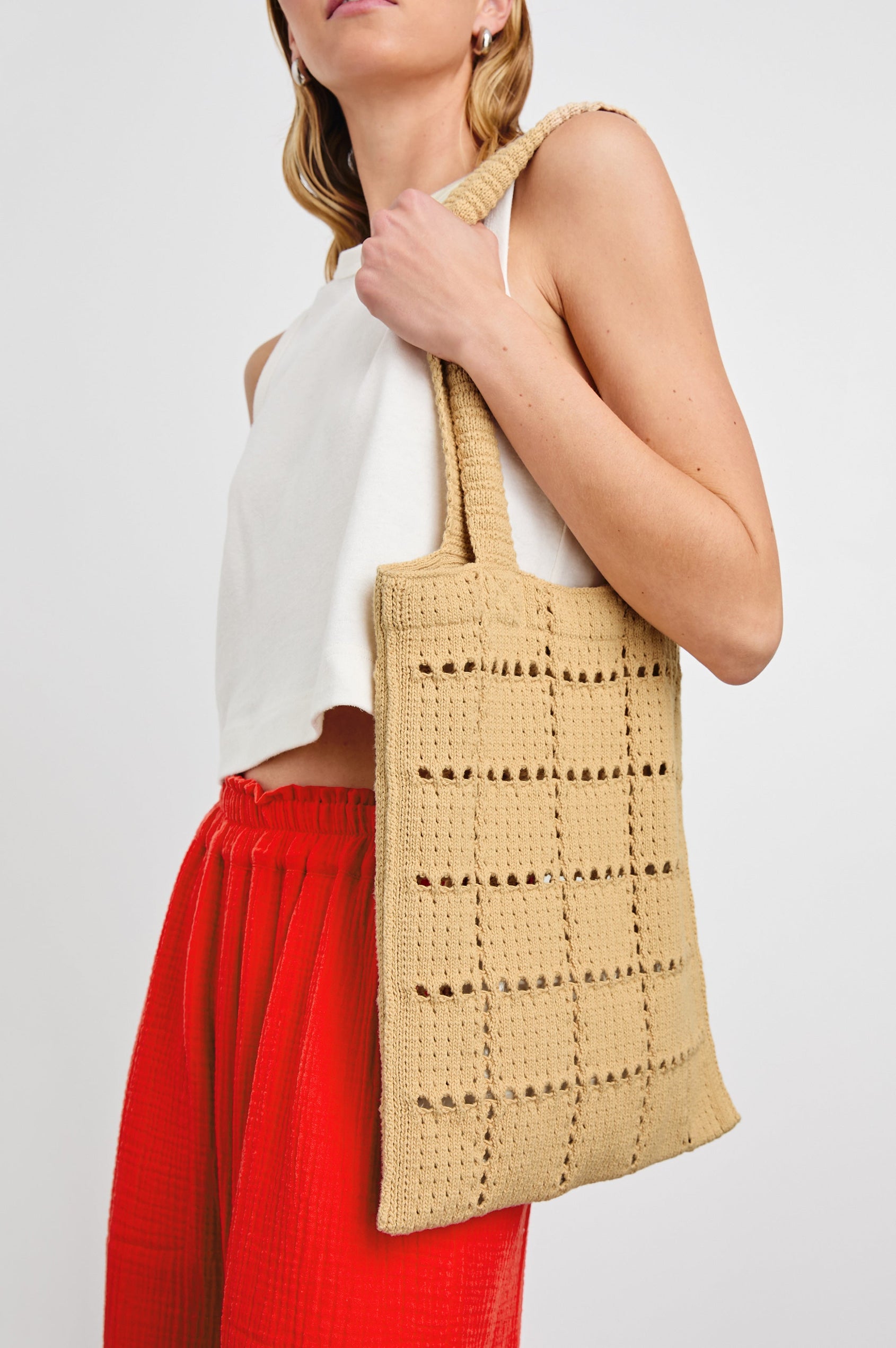 Crochet Rectangular Tote with Patchwork Grid Drop stiches in Rattan Colorway  - Side View Featured on Model