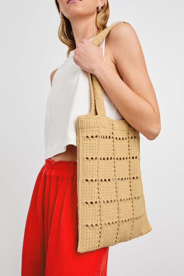 Crochet Rectangular Tote with Patchwork Grid Drop stiches in Rattan Colorway  - Side View Featured on Model