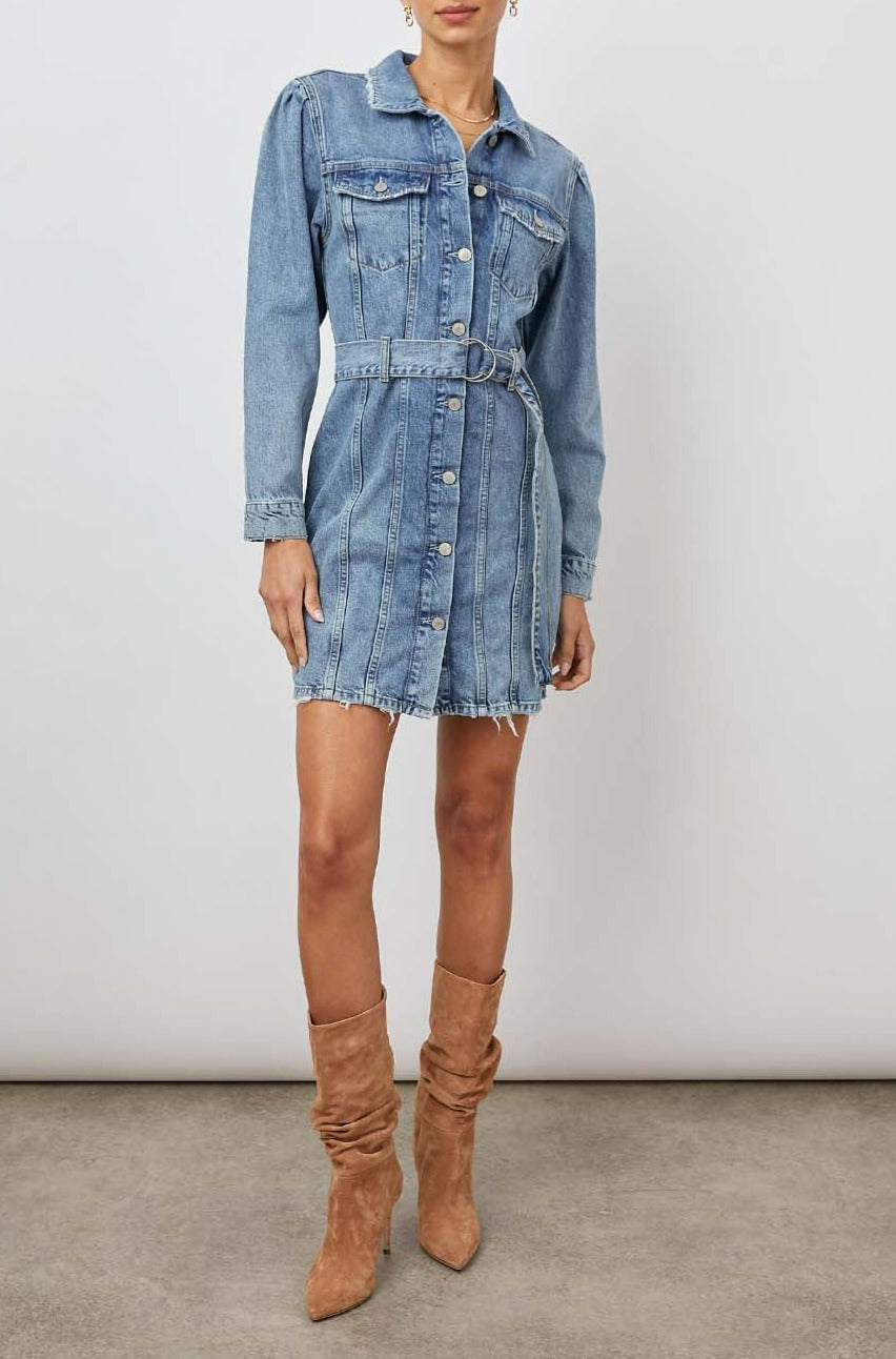Griffith Long-Sleeve Denim Mini Dress with Buttons Down the Front, a Fabric Double Ring Belt, Two Chest Button Flap Pockets, Frayed Trim and Vertical Seams Down the Front in Indigo Charm Colorway - Front Full Body View Featured on Model 