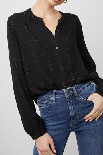 Eloise Long-Sleeve Button Up with an Open Collar in Ebony Tinsel Colorway, a plaid - Front Tucked View Featured on Model