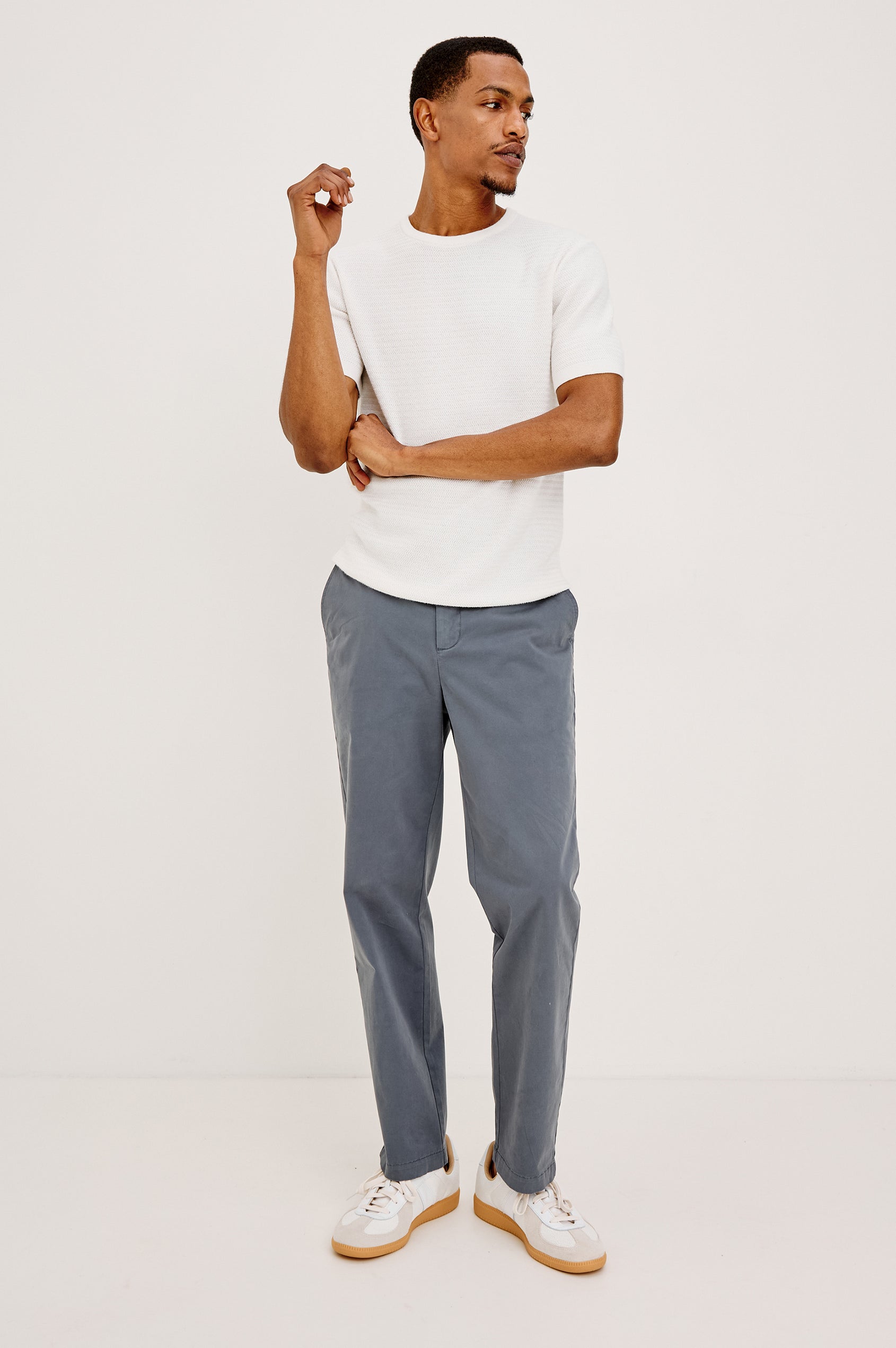 Theo T-Shirt in Ribbed Cotton-Cashmere With Crew Neckline, Short Sleeves, and Classic Fit in Porcelain Colorway - Full Body Front View Featured on Model
