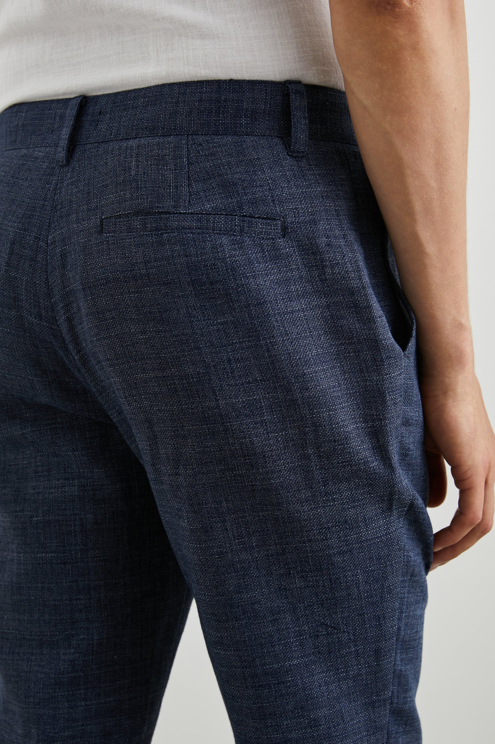 Thomas Pants with Two Front Pockets, Two Back Welt Pockets and Belt Loops in Navy Melange Colorway - Back View Featured on Model