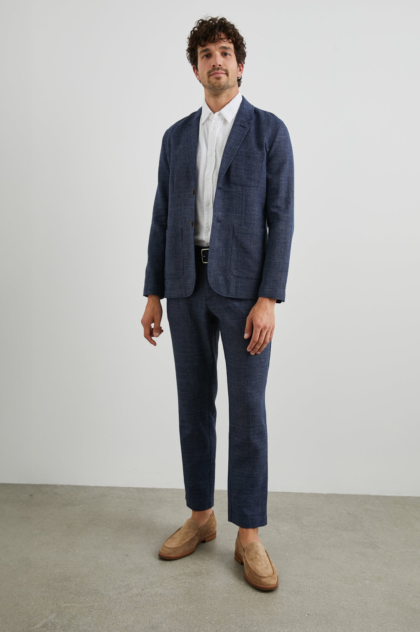 Thomas Pants with Two Front Pockets, Two Back Welt Pockets and Belt Loops in Navy Melange Colorway - Front Full Body View Featured on Model