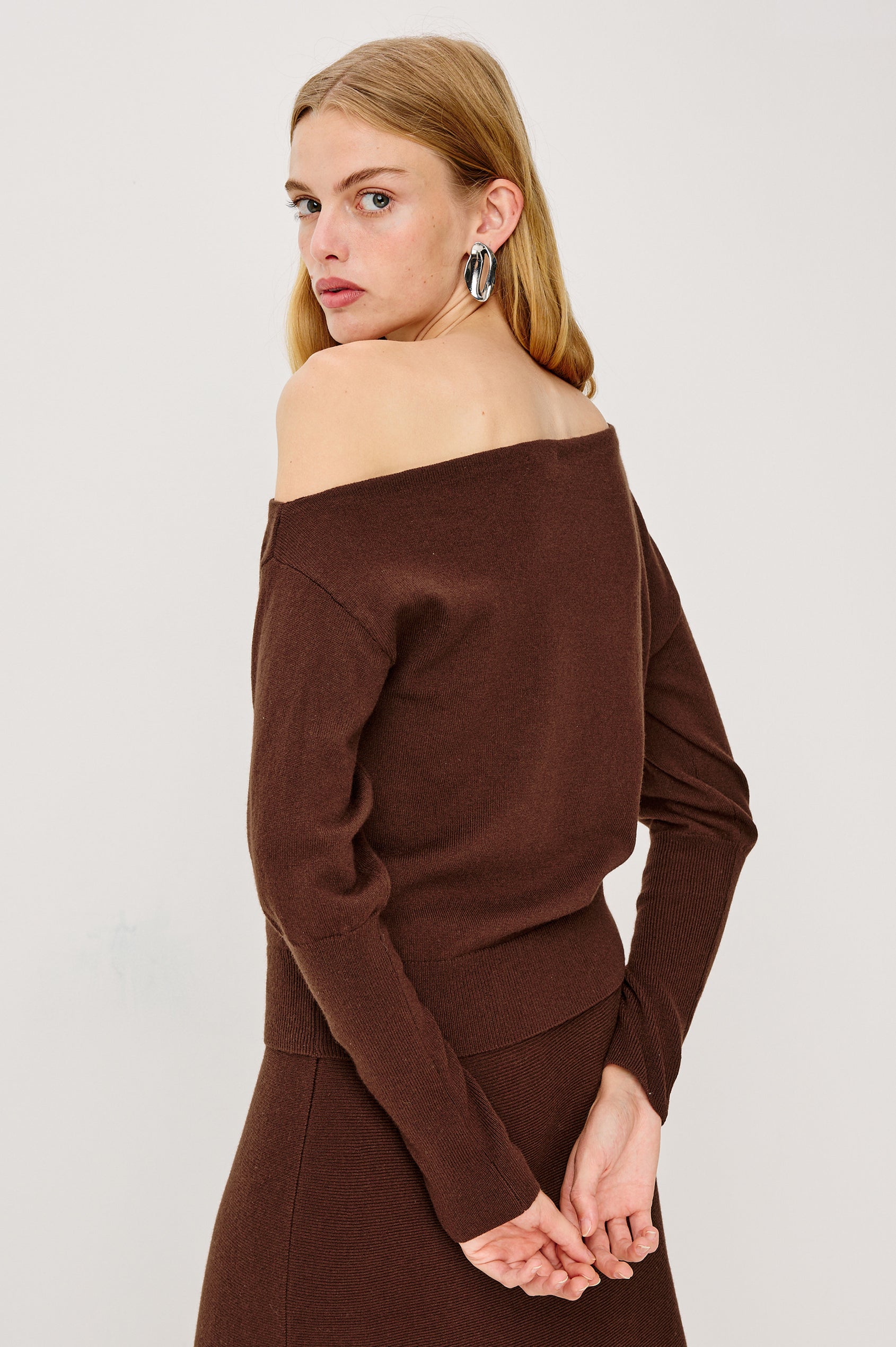 Tianna Off-The Shoulder Sweater in Wool Blend Knit With Long Sleeves in Bordeaux Colorway - Upper Body Back View Featured on Model