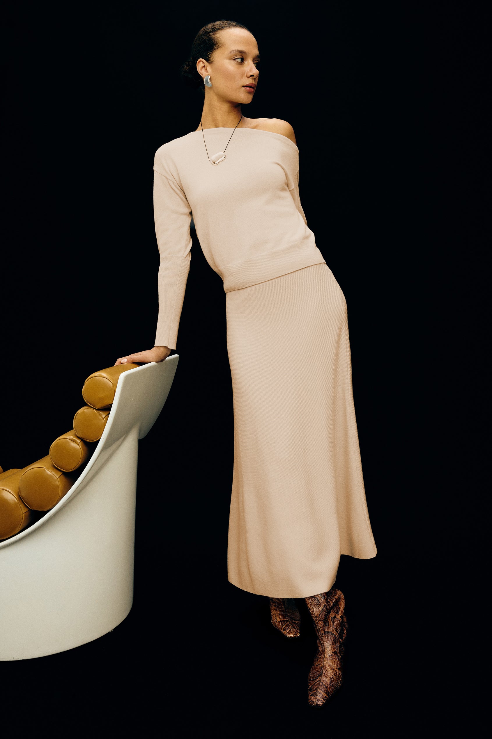 Tianna Off-Shoulder Sweater in Wool Blend With Dropped Shoulders, Long Sleeves, and Ribbed Trim in Ivory Colorway - Full Body Stylized Front View Featured on Model