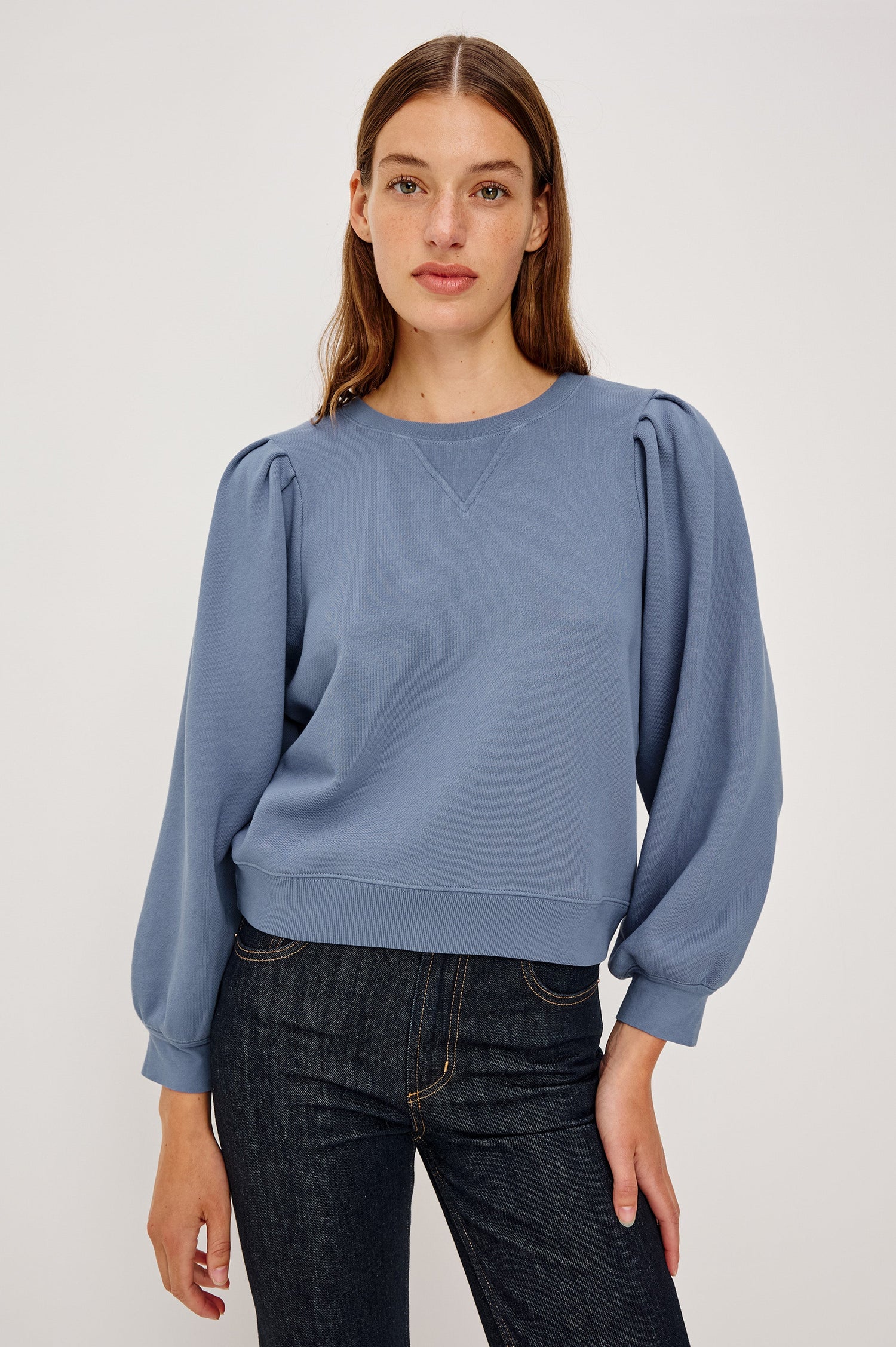 Tiffany Long-Sleeve Sweatshirt with a Crew Neck and Deep Pleated Sleeves in Faded Periwinkle Colorway - Front View Featured on Model