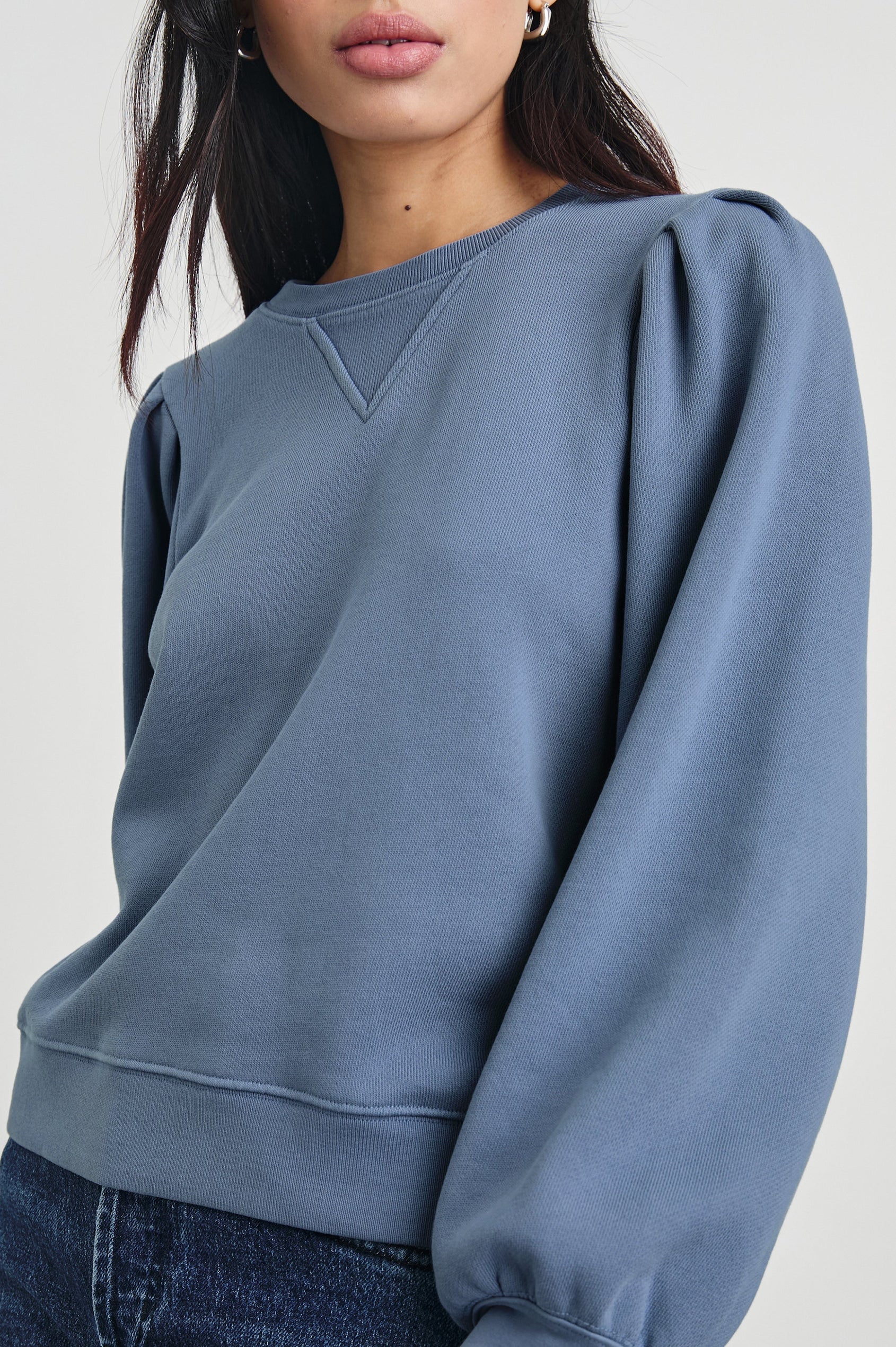 Tiffany Long-Sleeve Sweatshirt with a Crew Neck and Deep Pleated Sleeves in Faded Periwinkle Colorway - Front View Featured on Model