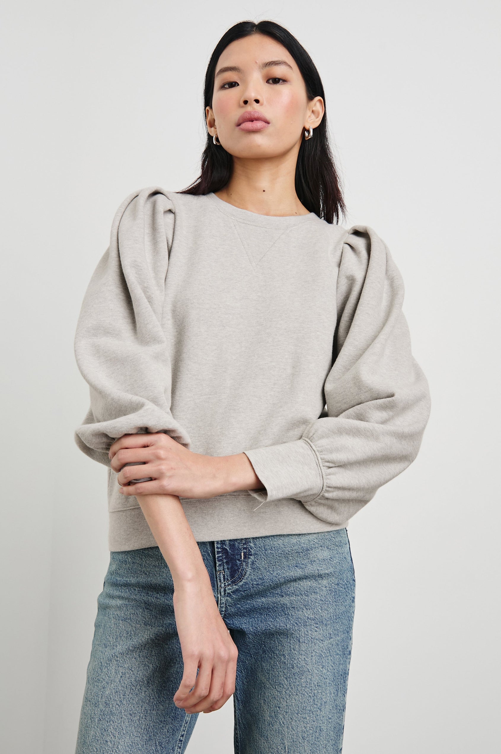 Tiffany Long-Sleeve Sweatshirt with a Crew Neck and Deep Pleated Sleeves in Heather Grey Colorway - Front View Featured on Model