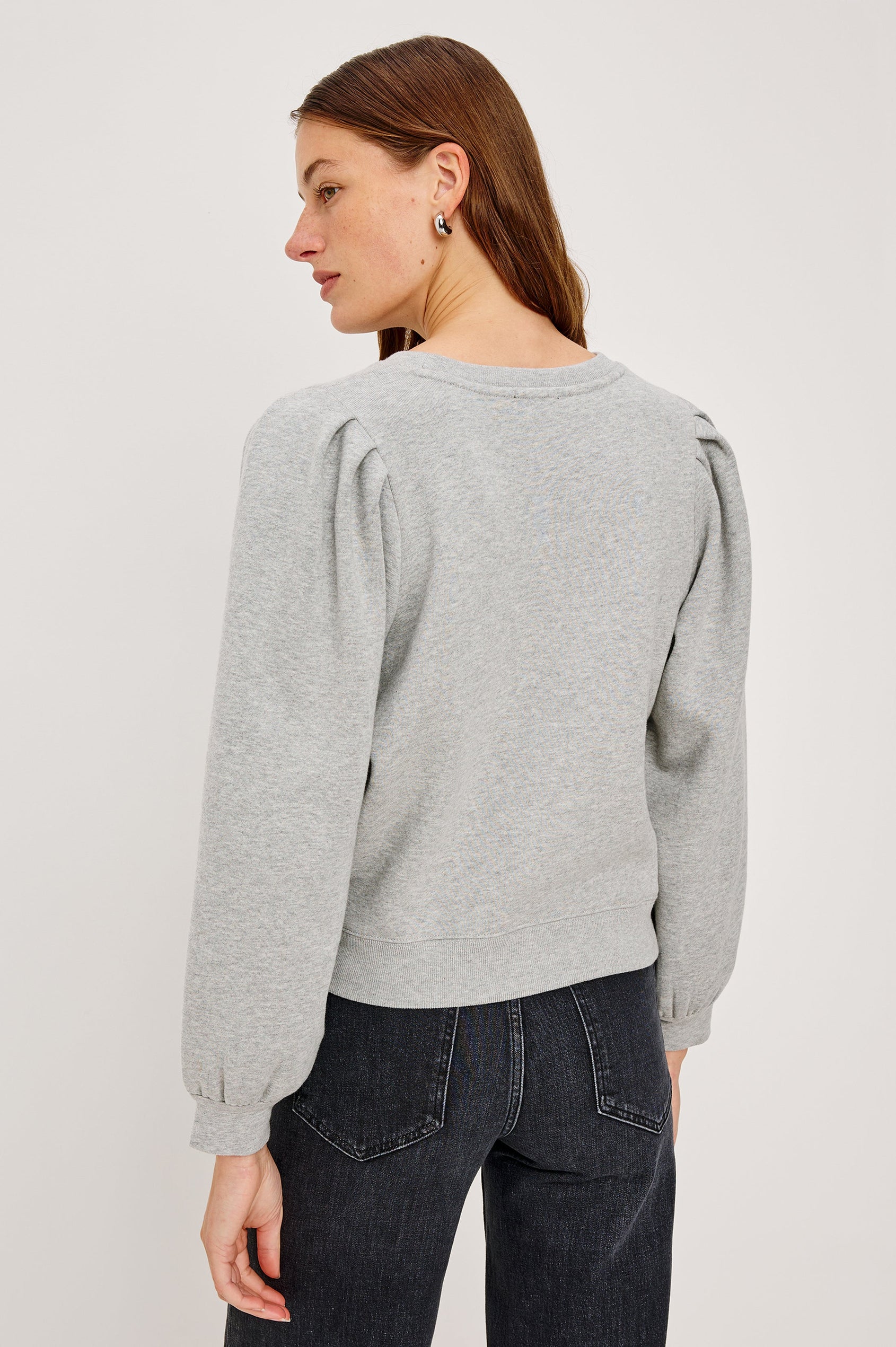 Tiffany Long-Sleeve Sweatshirt with a Crew Neck and Deep Pleated Sleeves in Heather Grey Colorway - Back View Featured on Model