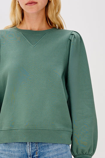 Tiffany Long-Sleeve Sweatshirt with a Crew Neck and Deep Pleated Sleeves in Lake Colorway - Close Up View Featured on Model