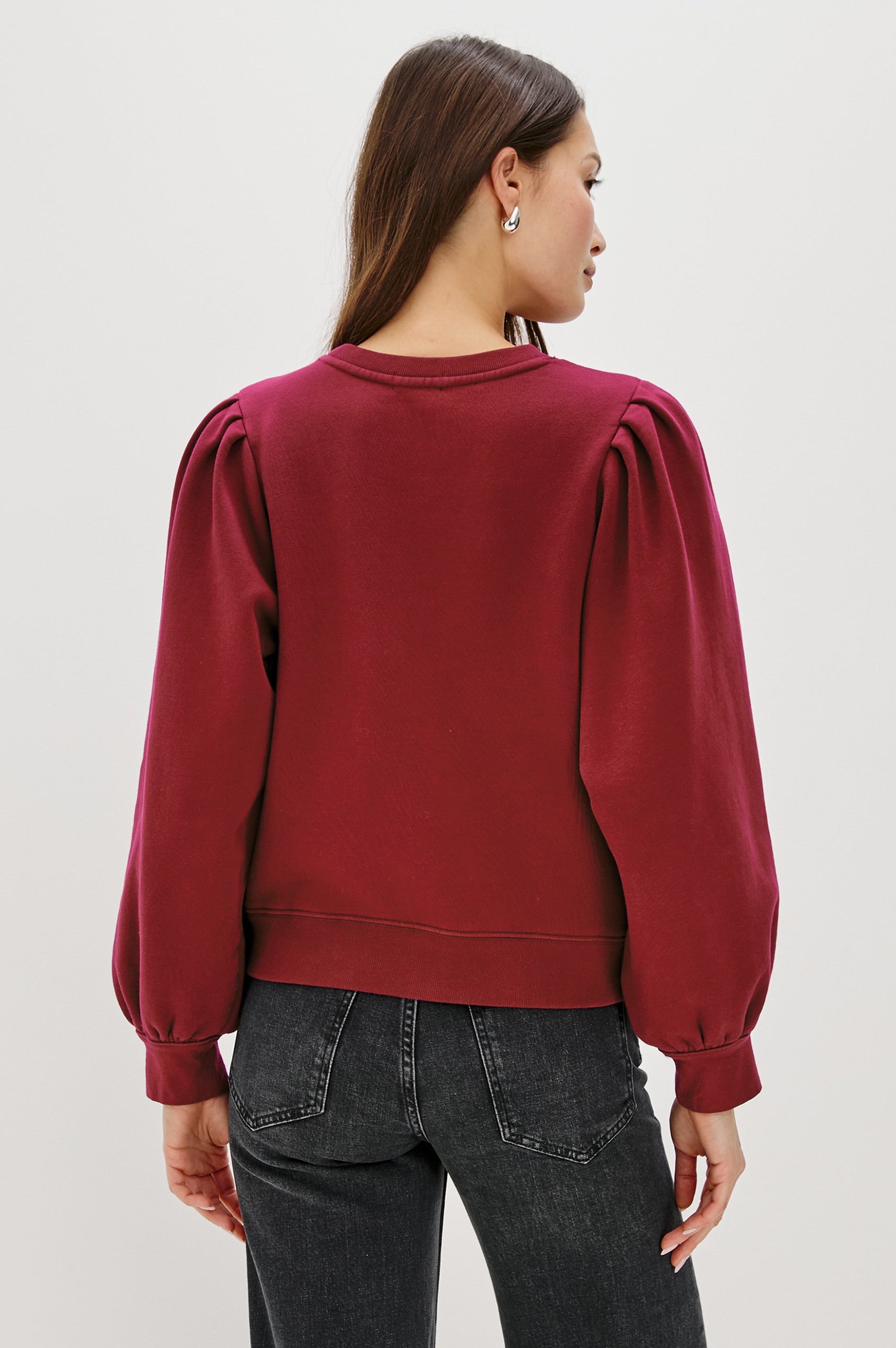 Tiffany Long-Sleeve Sweatshirt with a Crew Neck and Deep Pleated Sleeves in Merlot Colorway - Back View Featured on Model