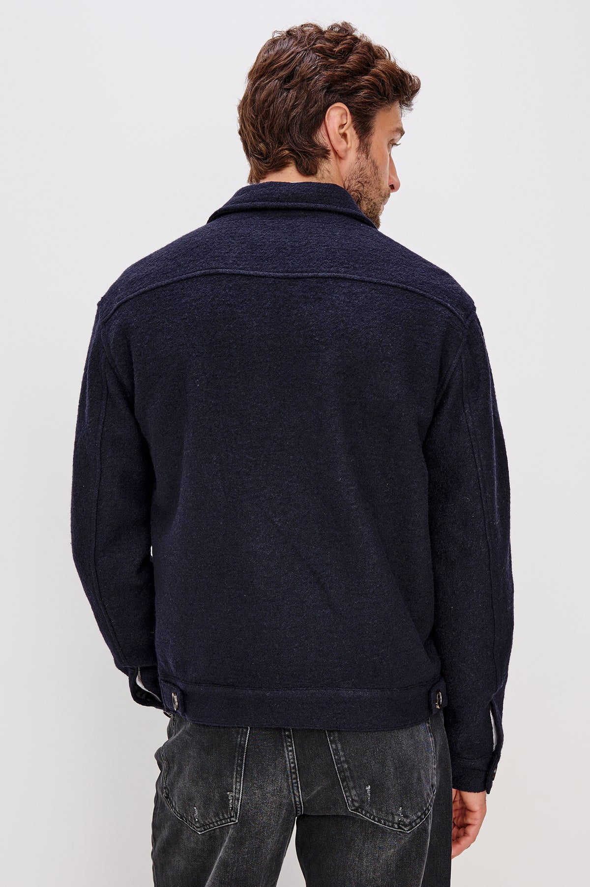 Tilman Zip Front Jacket With Collar, Buttoned Side Flap Pockets, and Logn Sleeves in Navy Boucle Colorway - Upper Body BackView Featured on Model