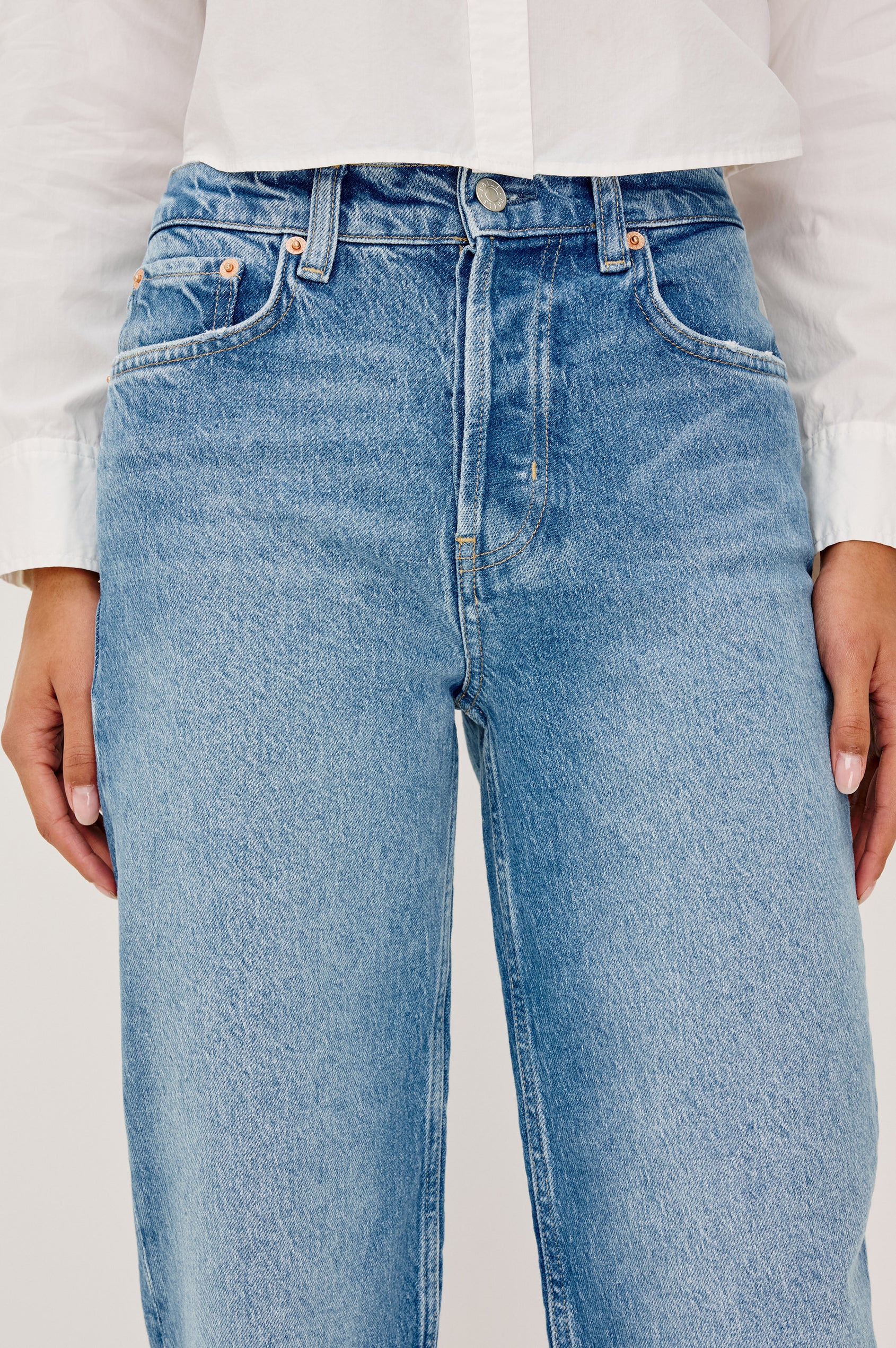 Topanga High-Rise Wide Straight Leg Jean in With 5-Pockets and a Front Zip-Fly in Baja Blue Colorway - close up View Featured on Model