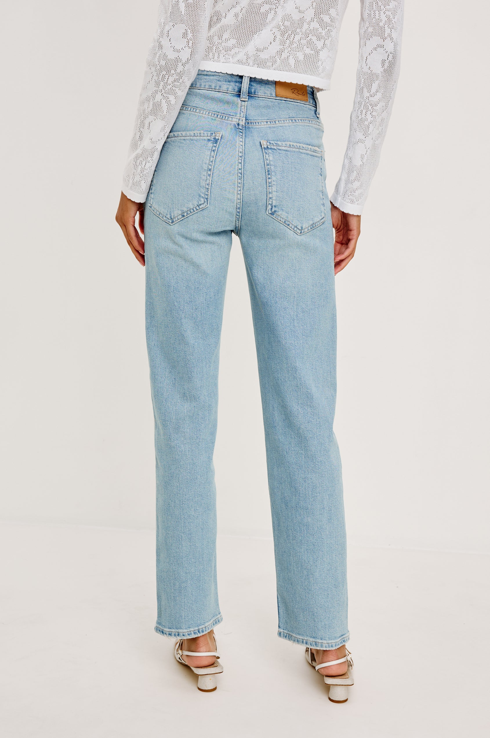 Topanga High-Rise Wide Straight Leg Jean in Denim With 5-Pockets, Embroidery, and Front Zip-Fly in Dainty Rose Colorway - Lower Body Back View Featured on Model