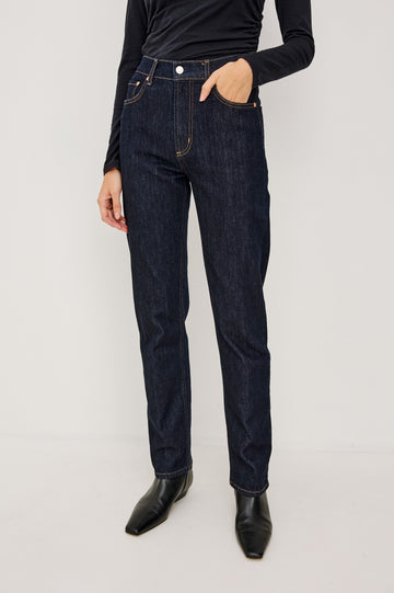 Topanga High-Rise Wide Straight Leg Jean in Dark Wash Denim With 5-Pockets and a Front Zip-Fly in Midnight Blues Colorway - Lower Body Front View Featured on Model