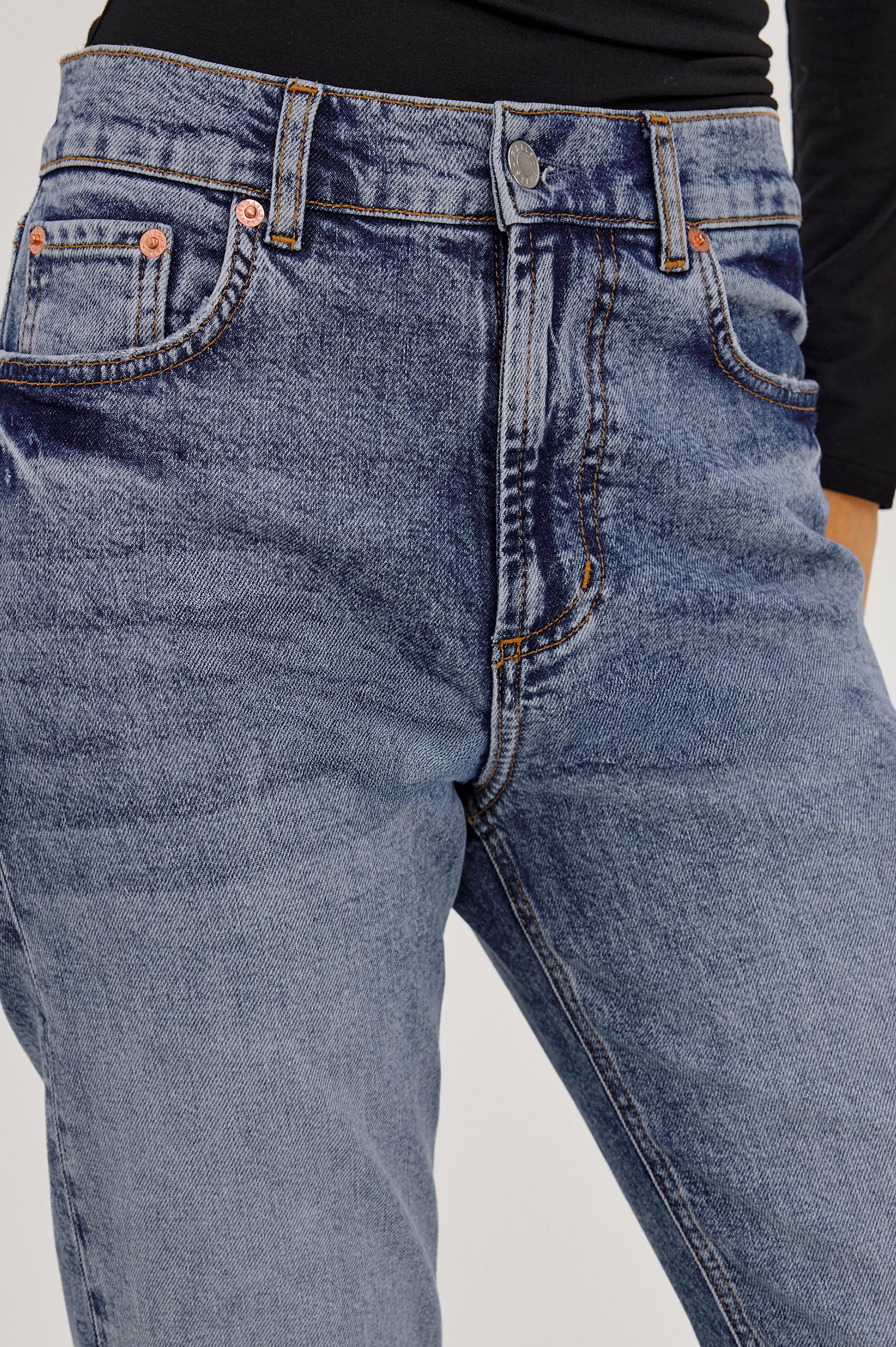 petite Topanga Straight Jean in Comfort-Stretch Denim With High-Rise, Distressed Knee, 5-Pockets, and Zipper Fly in Rancher Deconstructed Colorway - Lower Body Front View Featured on Model