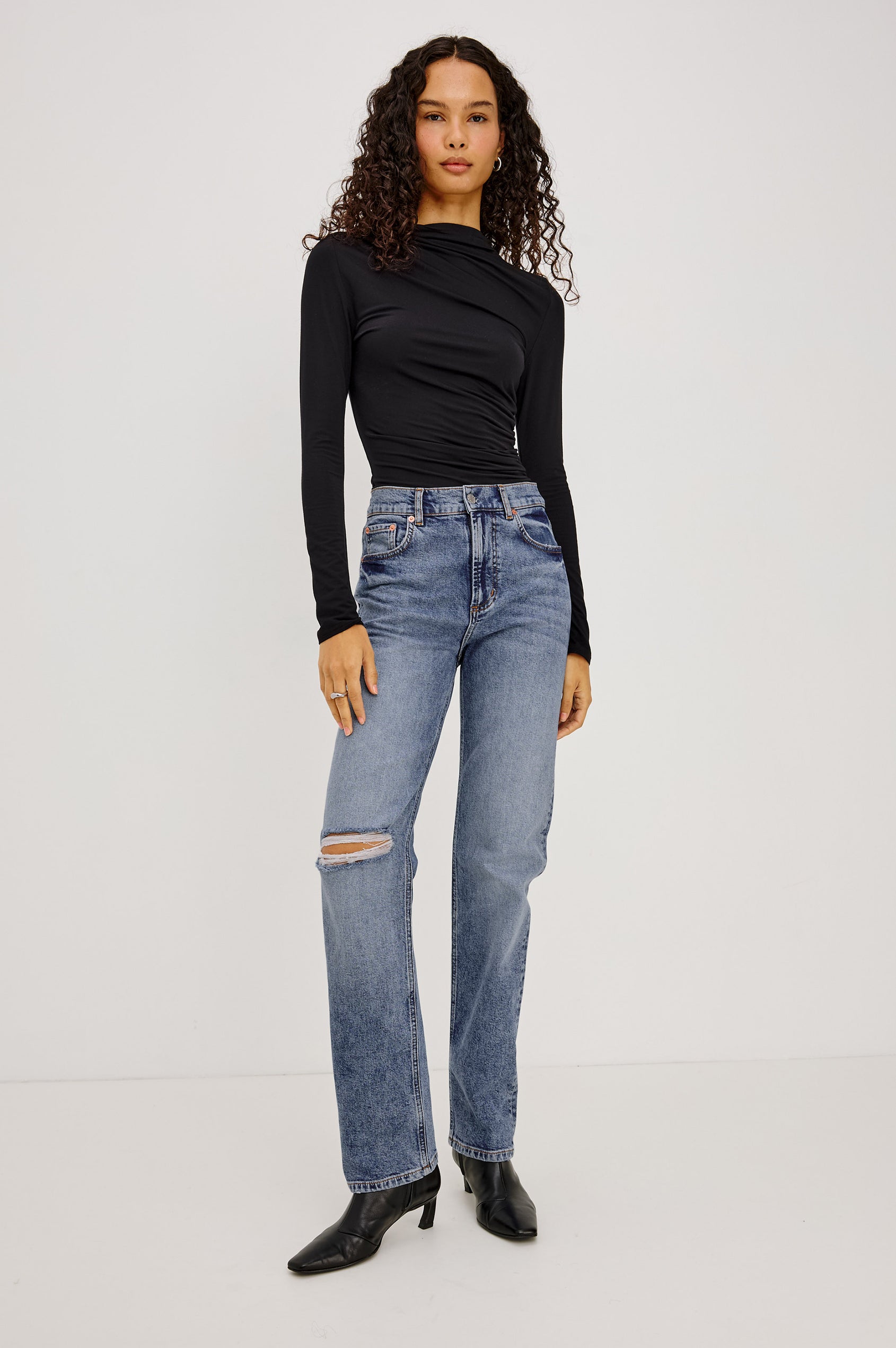 Petite Topanga Straight Jean in Comfort-Stretch Denim With High-Rise, Distressed Knee, 5-Pockets, and Zipper Fly in Rancher Deconstructed Colorway - Full Body Front View Featured on Model