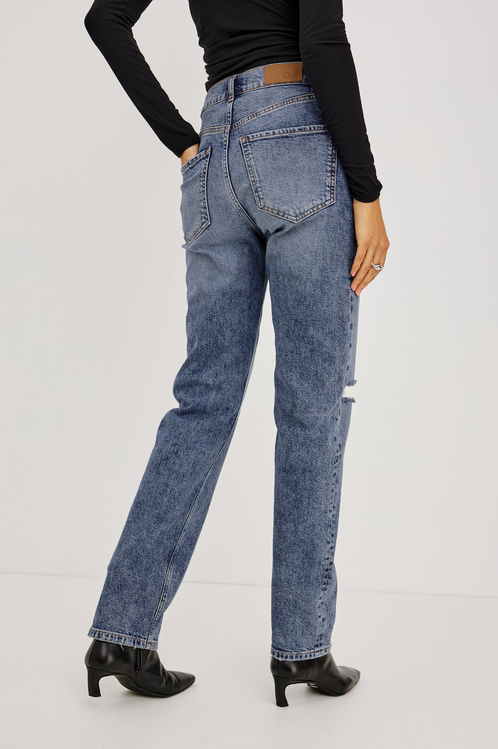 Petite Topanga Straight Jean in Comfort-Stretch Denim With High-Rise, Distressed Knee, 5-Pockets, and Zipper Fly in Rancher Deconstructed Colorway - Lower Body Back View Featured on Model