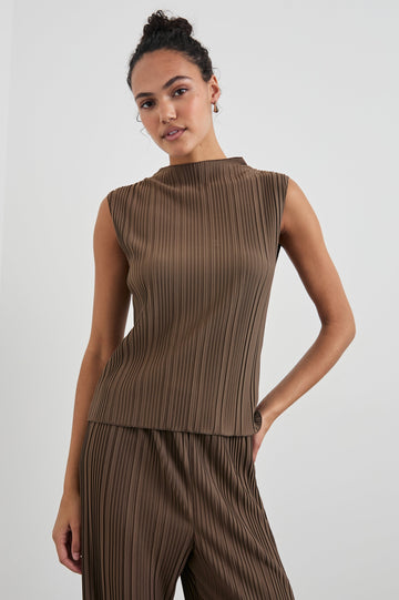 Trea Sleeveless Top with a Mock Neck and Pleated Texture in Morel Colorway - Front View Featured on Model