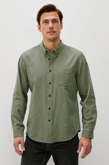 Tristan Long-Sleeve Button Down with a Chest Patch Pocket in Surplus Colorway, a olive green  - Front View Featured on Model