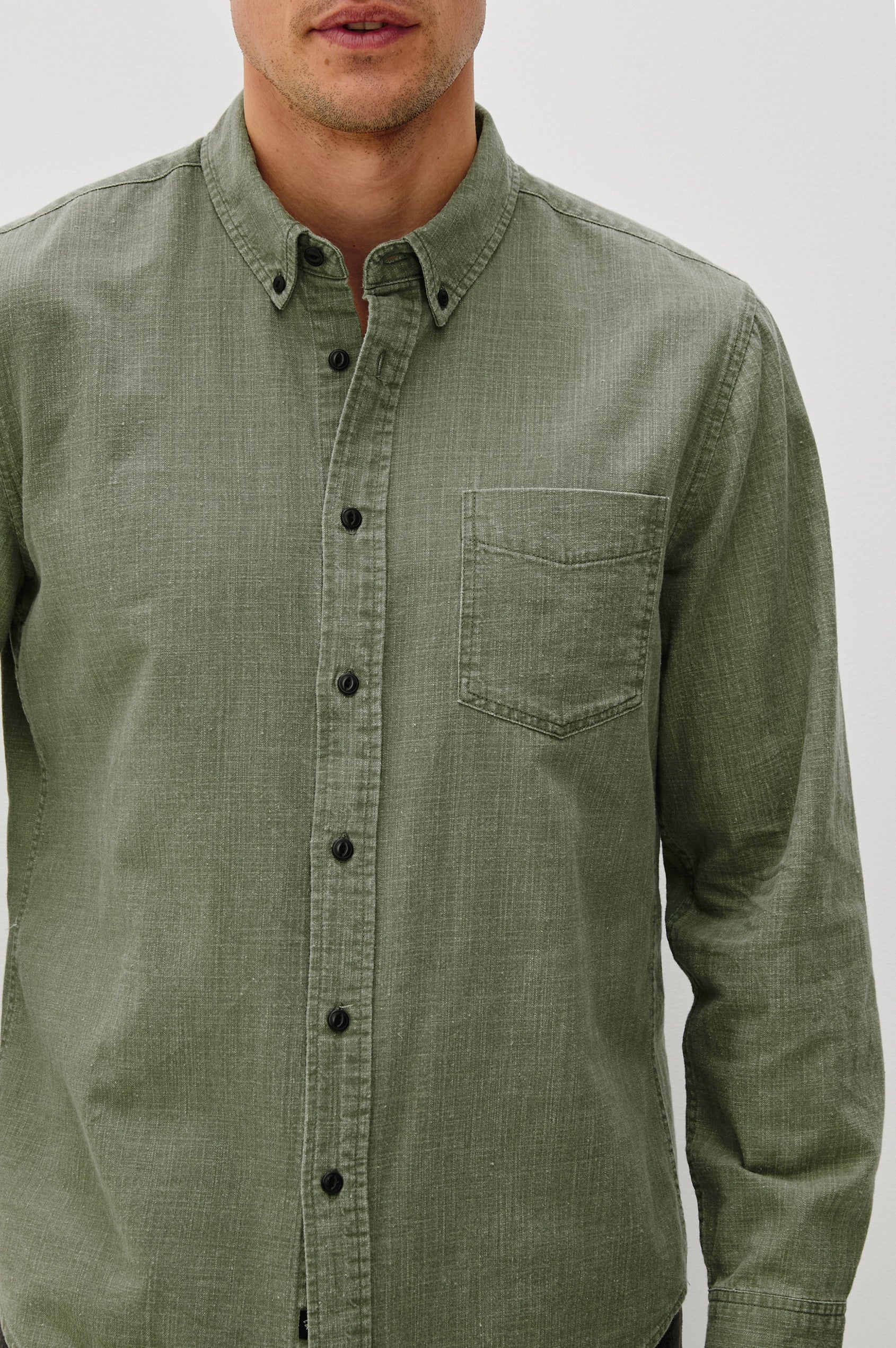 Tristan Long-Sleeve Button Down with a Chest Patch Pocket in Surplus Colorway, a olive green  - Front Detail View Featured on Model