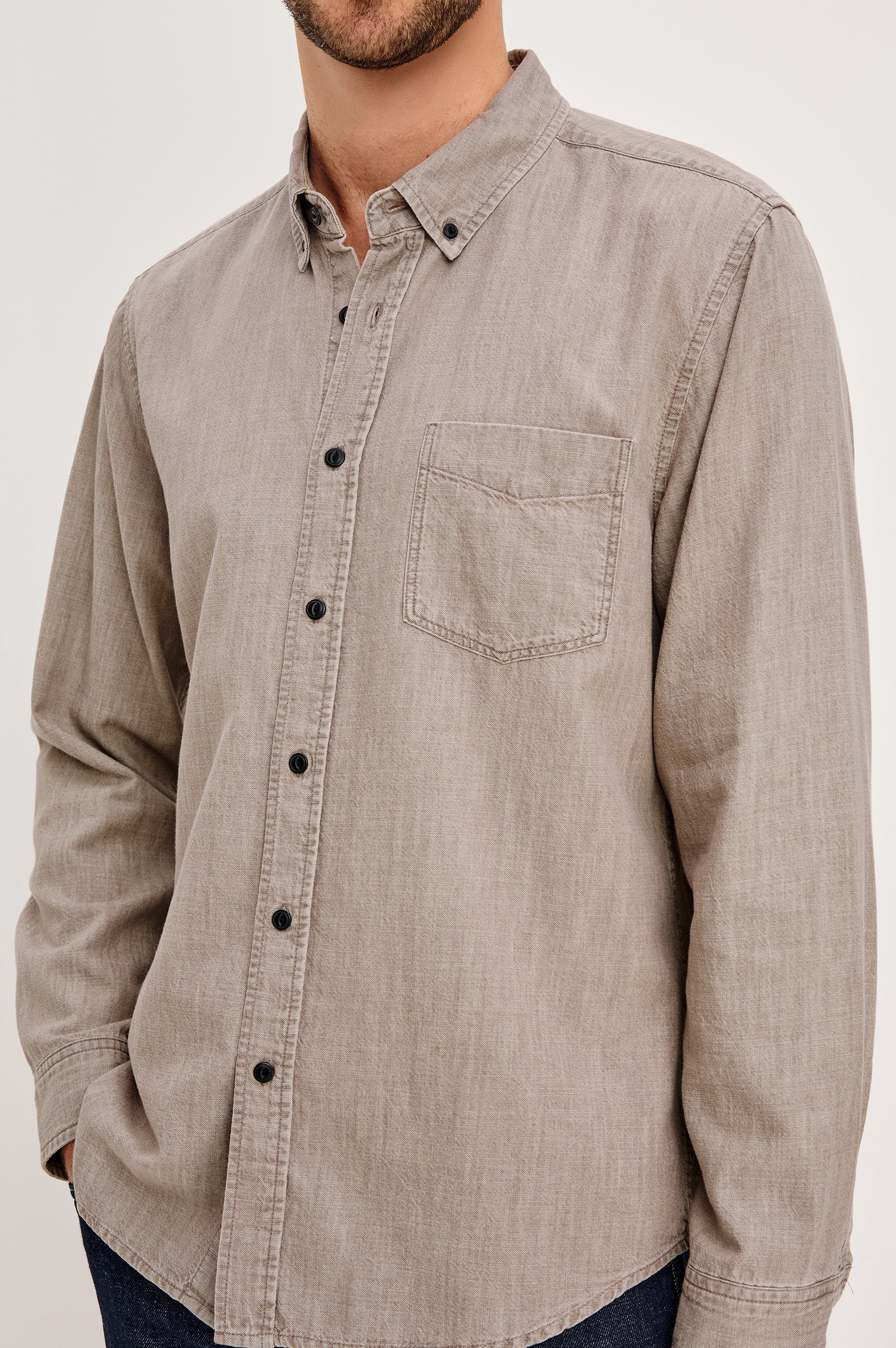 Tristan Long-Sleeve Button Down with a Chest Patch Pocket in Trail Mix Colorway, a brownish grey - Front Detail View Featured on Seated Model