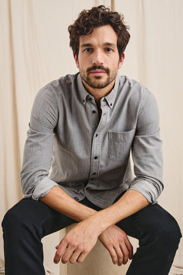 Tristan Long-Sleeve Button Down with a Chest Patch Pocket in Trail Mix Colorway, a brownish grey - Front Full Body View Featured on Seated Model