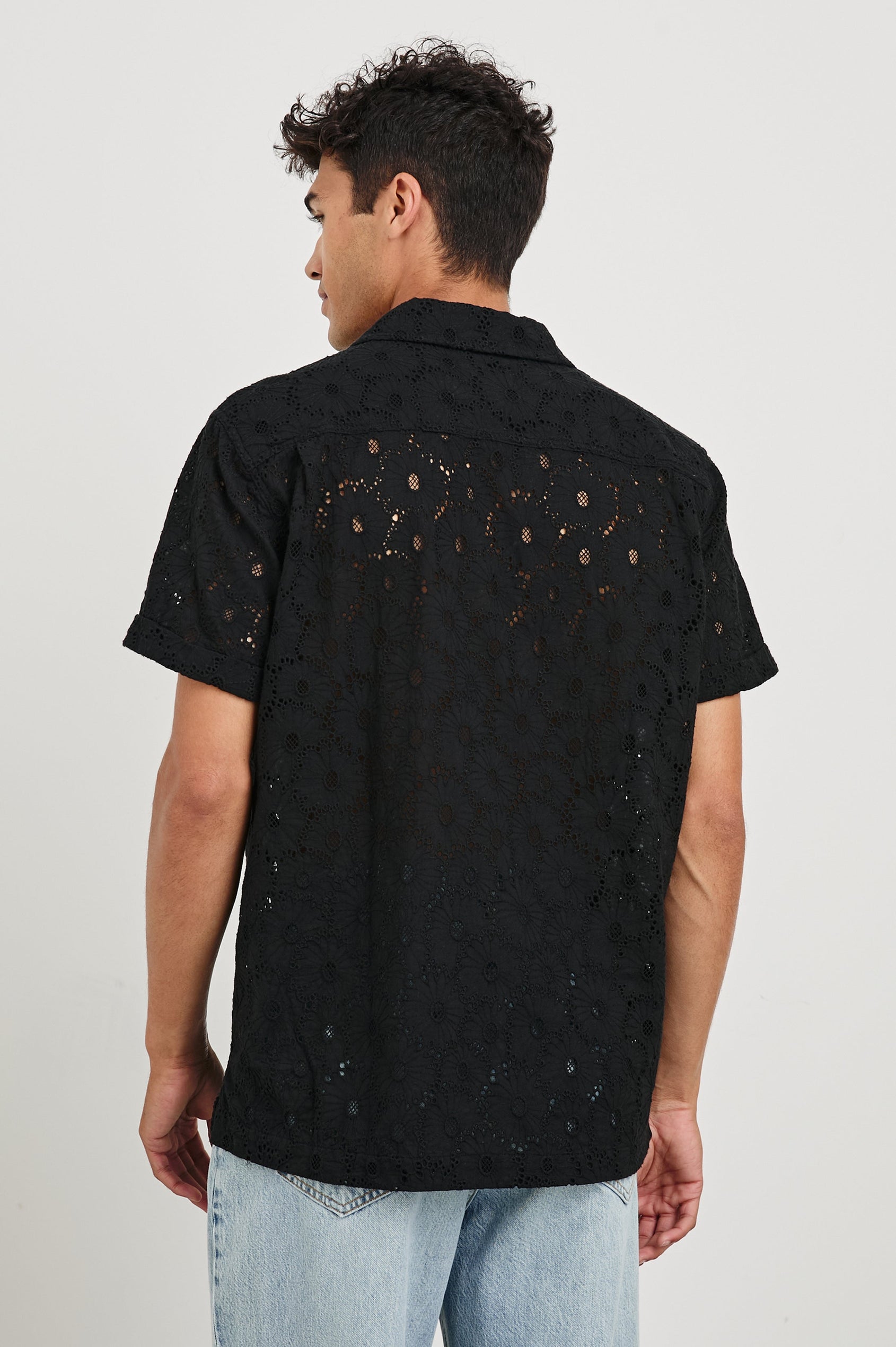 Tyler embroidered short sleeve button up with collar in Black Floral - back view on model