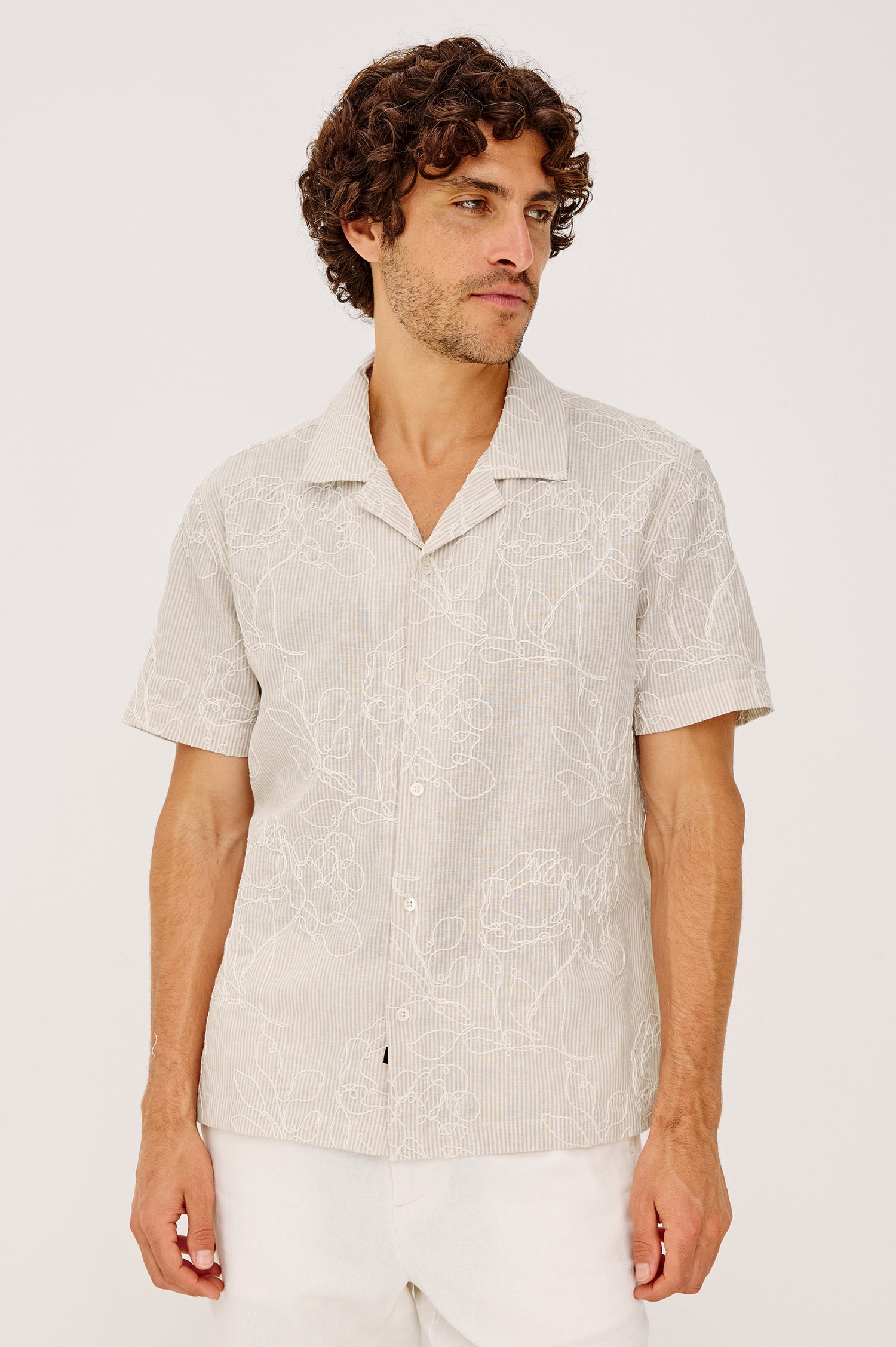 Tyler Camp Shirt in Stretch Cotton With Open Collar, Short Sleeves, and Classic Fit in Bouquet Khaki Stripe Colorway - Upper Body Front View Featured on Model