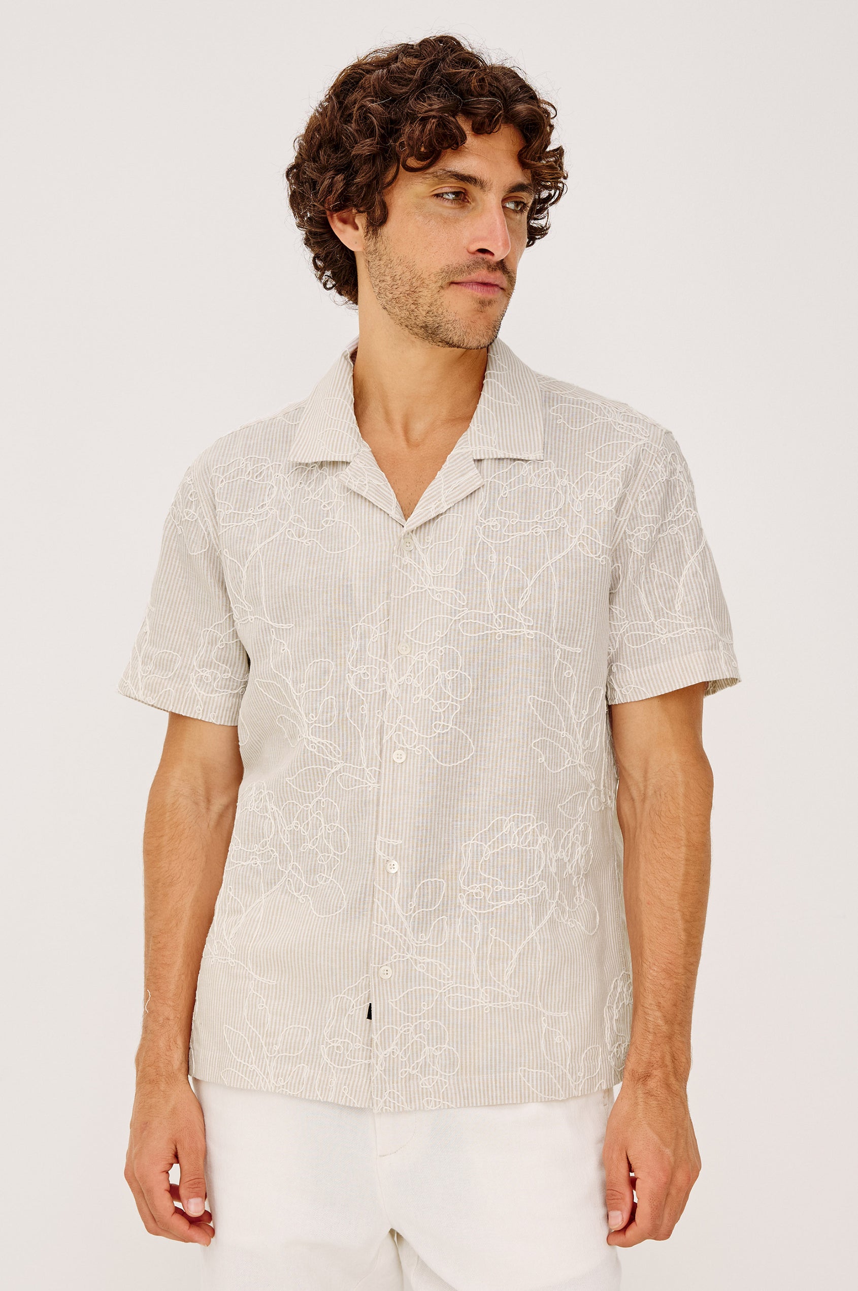Tyler Camp Shirt in Stretch Cotton With Open Collar, Short Sleeves, and Classic Fit in Bouquet Khaki Stripe Colorway - Upper Body Front View Featured on Model