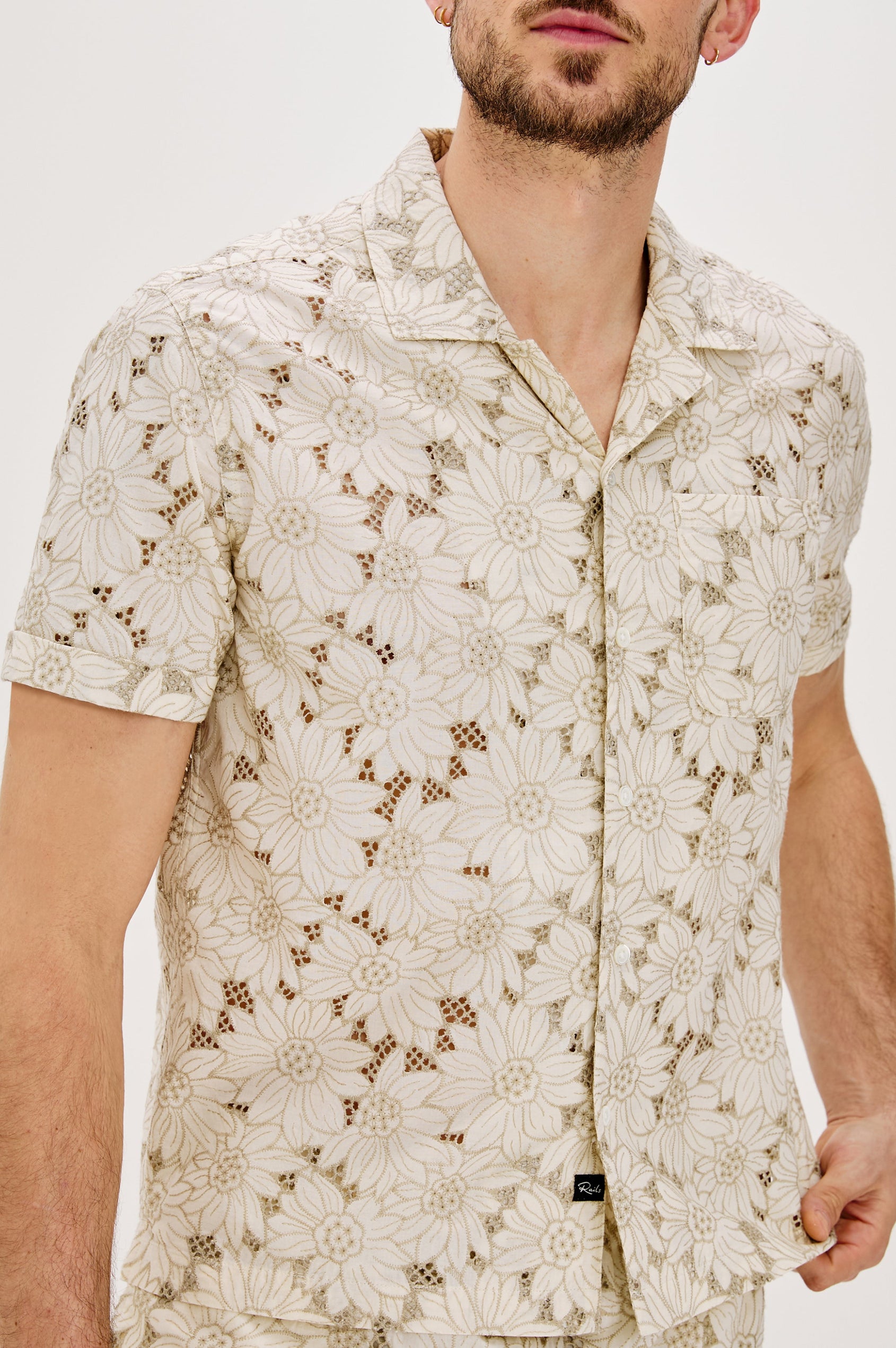 Tyler Collared Button Front Shirt with Short Sleeves in Multi Blue Colorway. Front Detail View Shown on Model.