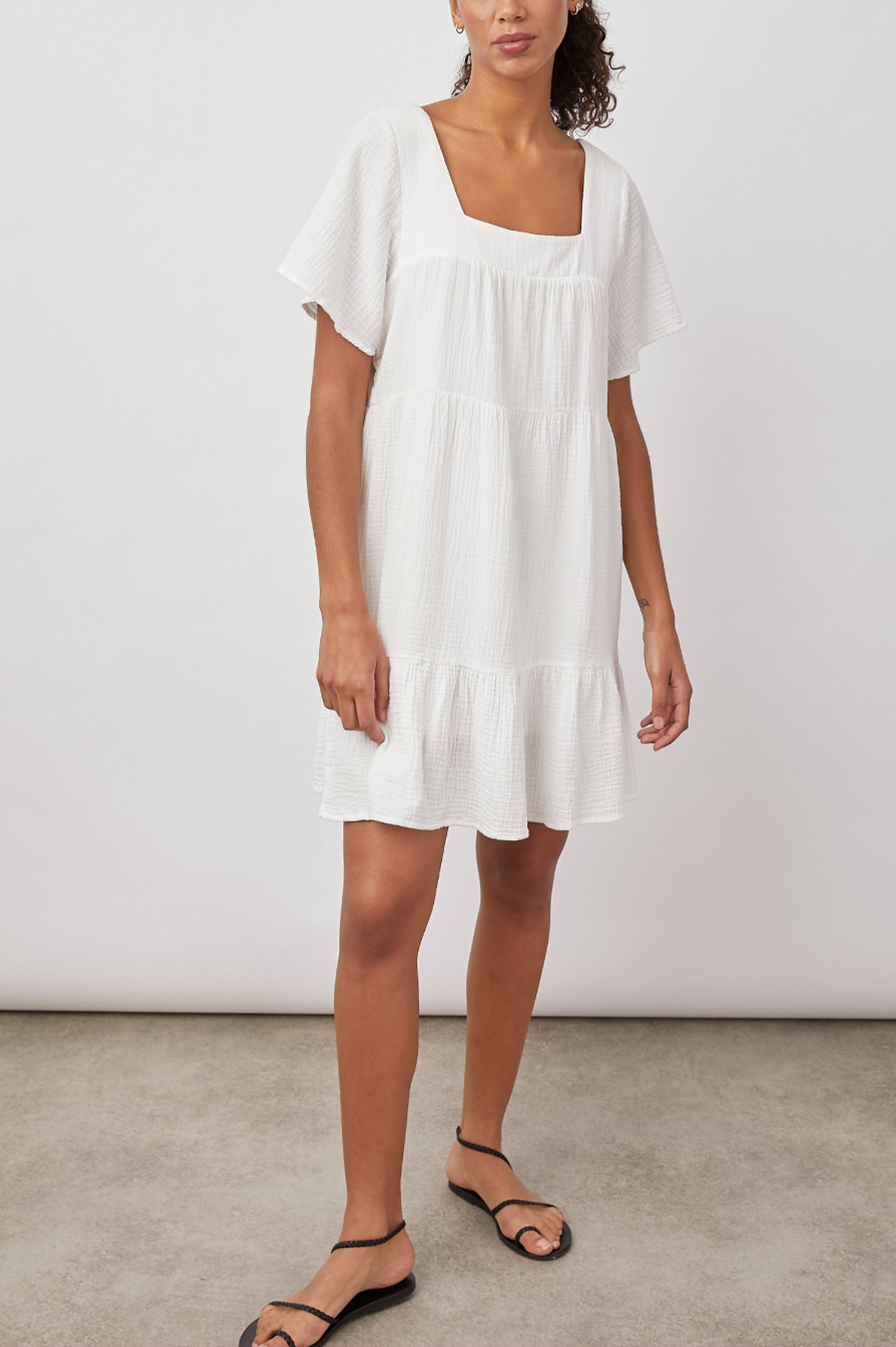 Valentina Short-Sleeve Tiered Mini Dress with a Square Neckline in White Colorway - Front Full Body View Featured on Model 