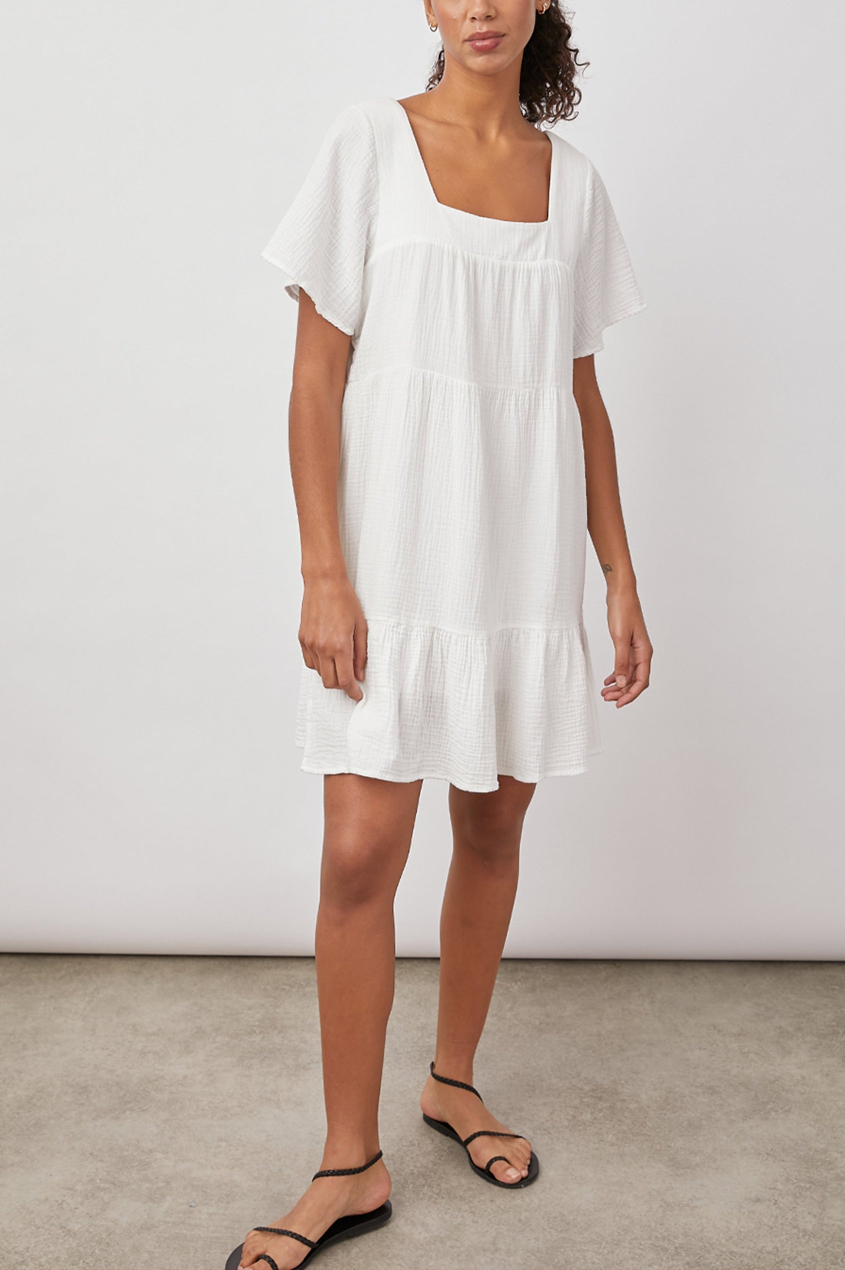 Valentina Short-Sleeve Tiered Mini Dress with a Square Neckline in White Colorway - Front Full Body View Featured on Model 