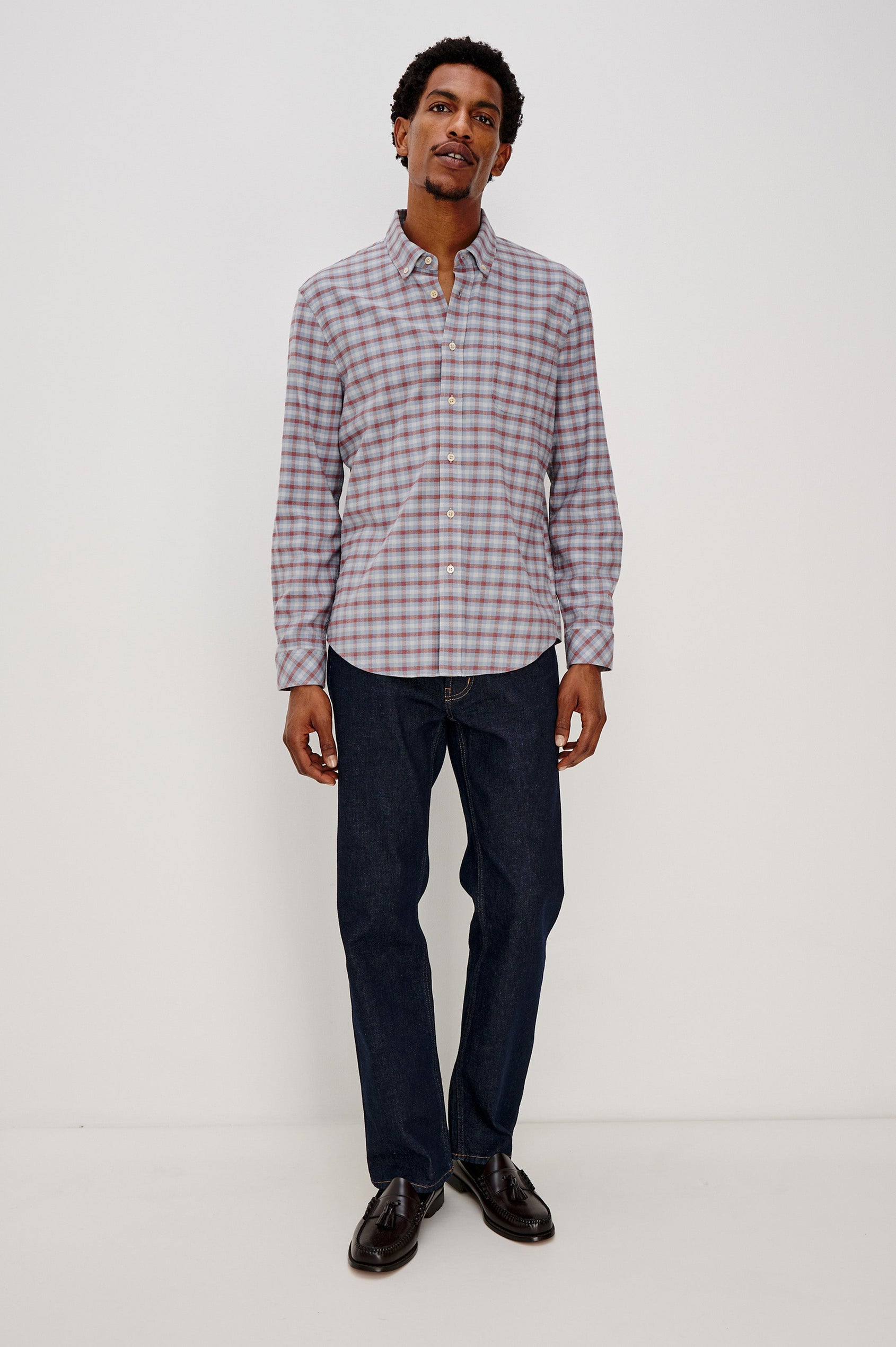Vance button front collared shirt with long sleeves, collard stand buttons and a single chest pocket in Blue Ruby Check colorway. Front full body view featured on model.