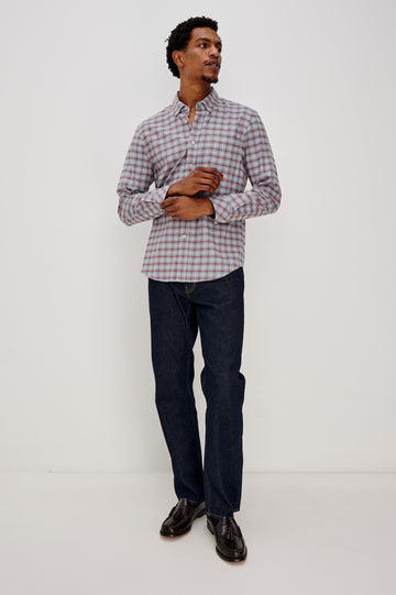 Vance button front collared shirt with long sleeves, collard stand buttons and a single chest pocket in Blue Ruby Check colorway. Front full body view featured on model.