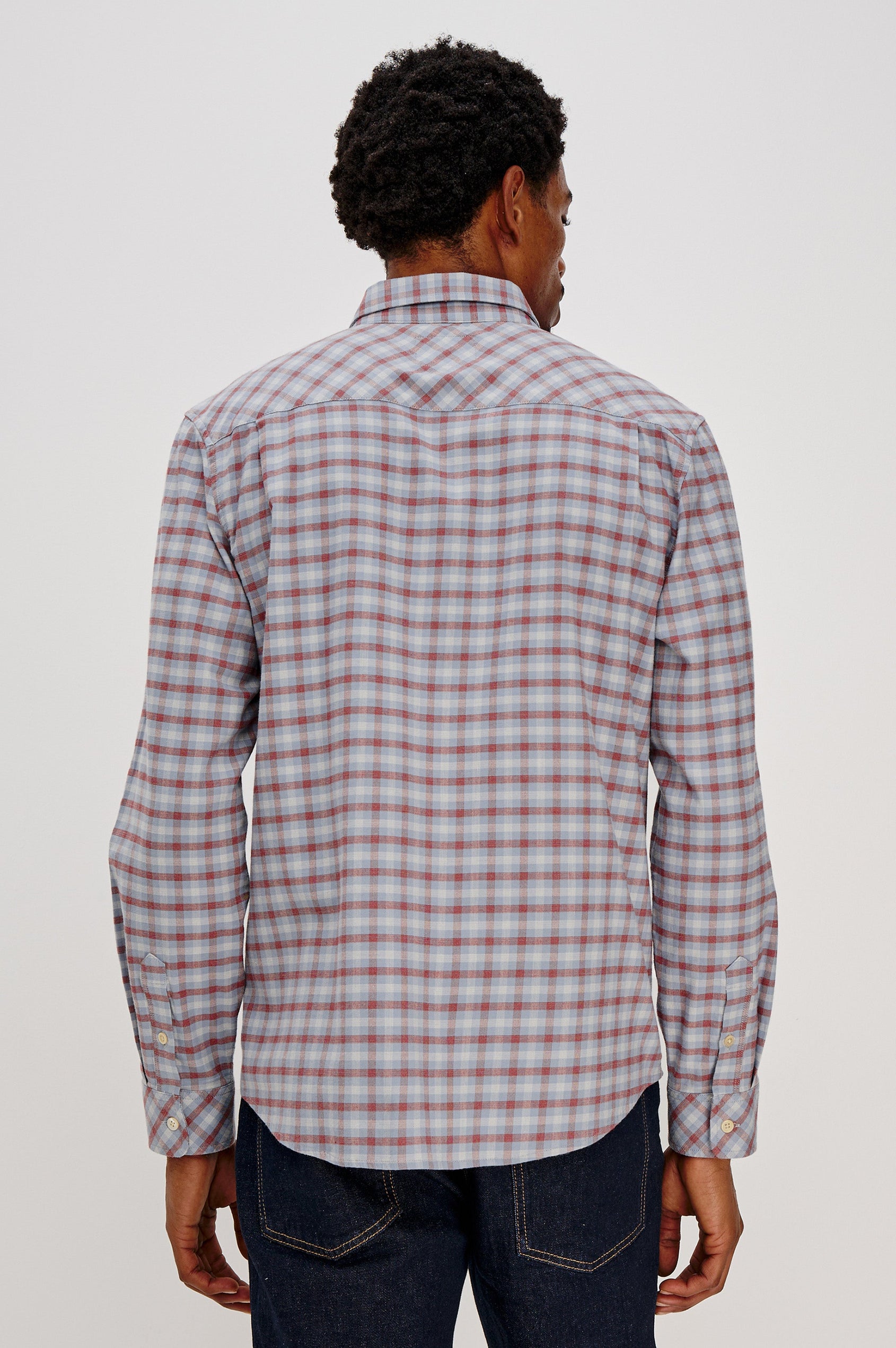Vance button front collared shirt with long sleeves, collard stand buttons and a single chest pocket in Blue Ruby Check colorway. Back view featured on model.