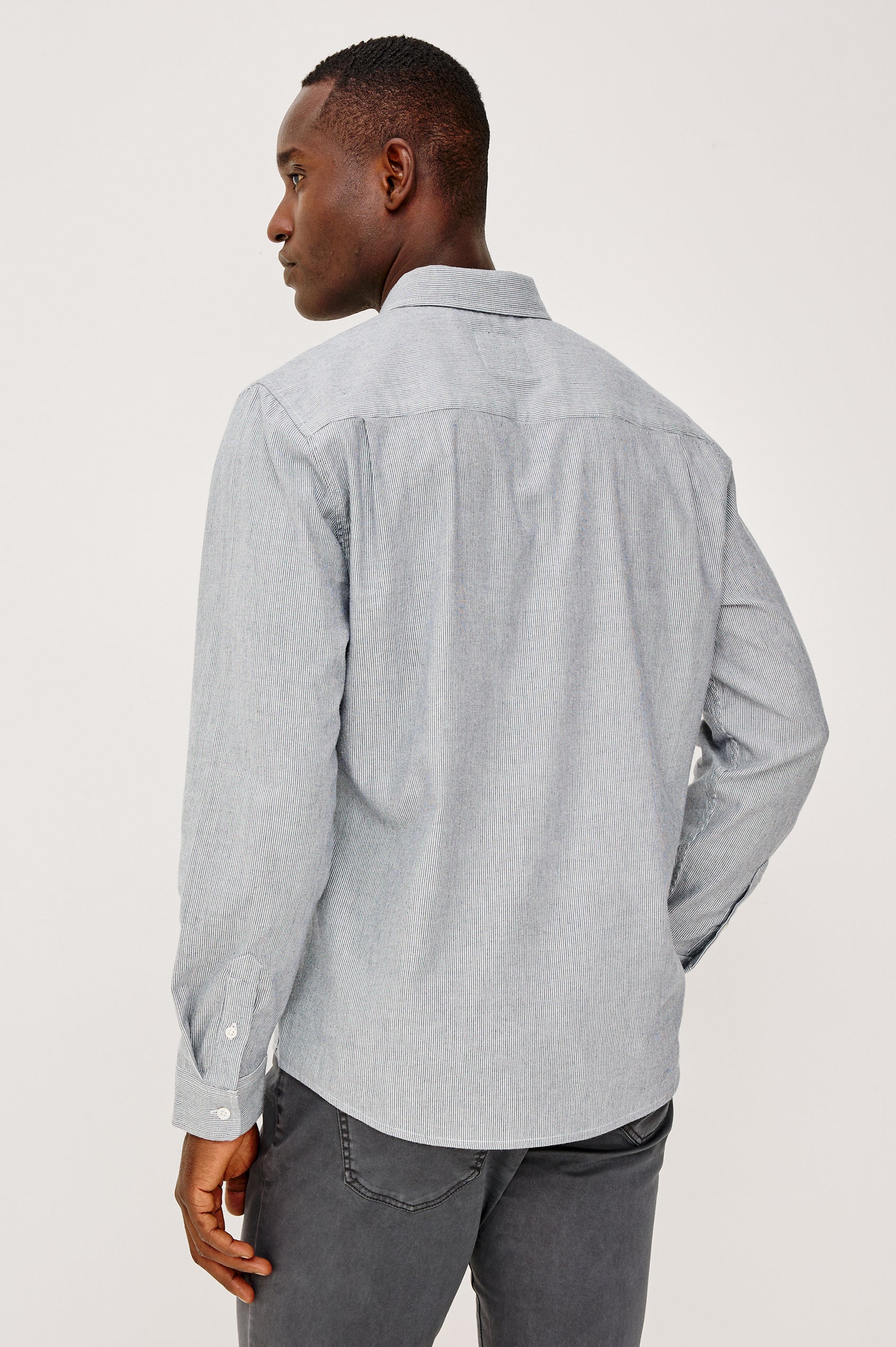 Vance Front Button Shirt in Cotton Blend With Collar, Long Sleeves, and Classic Fit in Blue White Stripe Colorway - Upper Body Back View Featured on Model