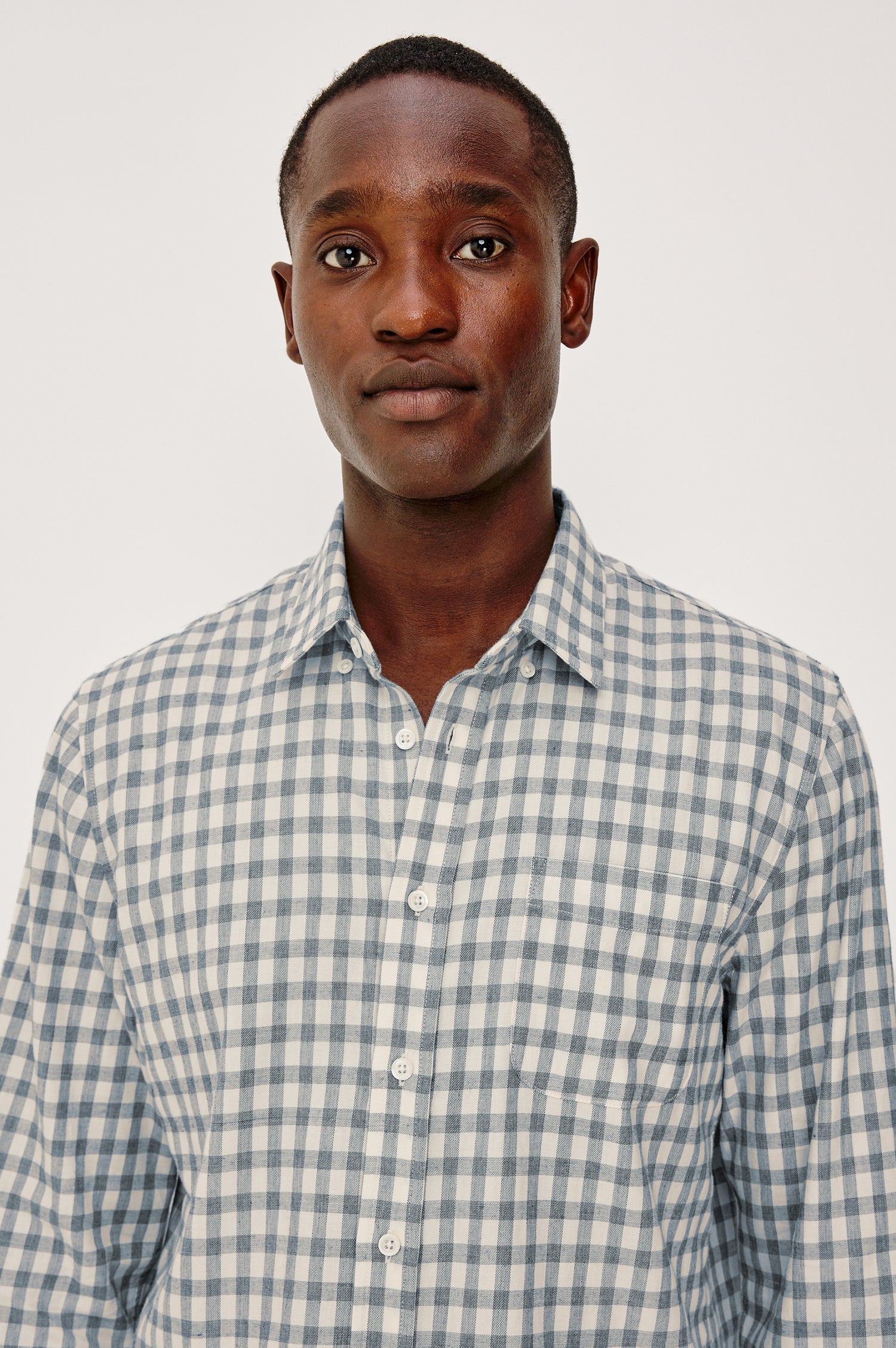 Vance Front Button Shirt in Cotton Blend With Collar, Long Sleeves, and Classic Fit in Bone Navy Check Colorway - Upper Body Front View Featured on Model
