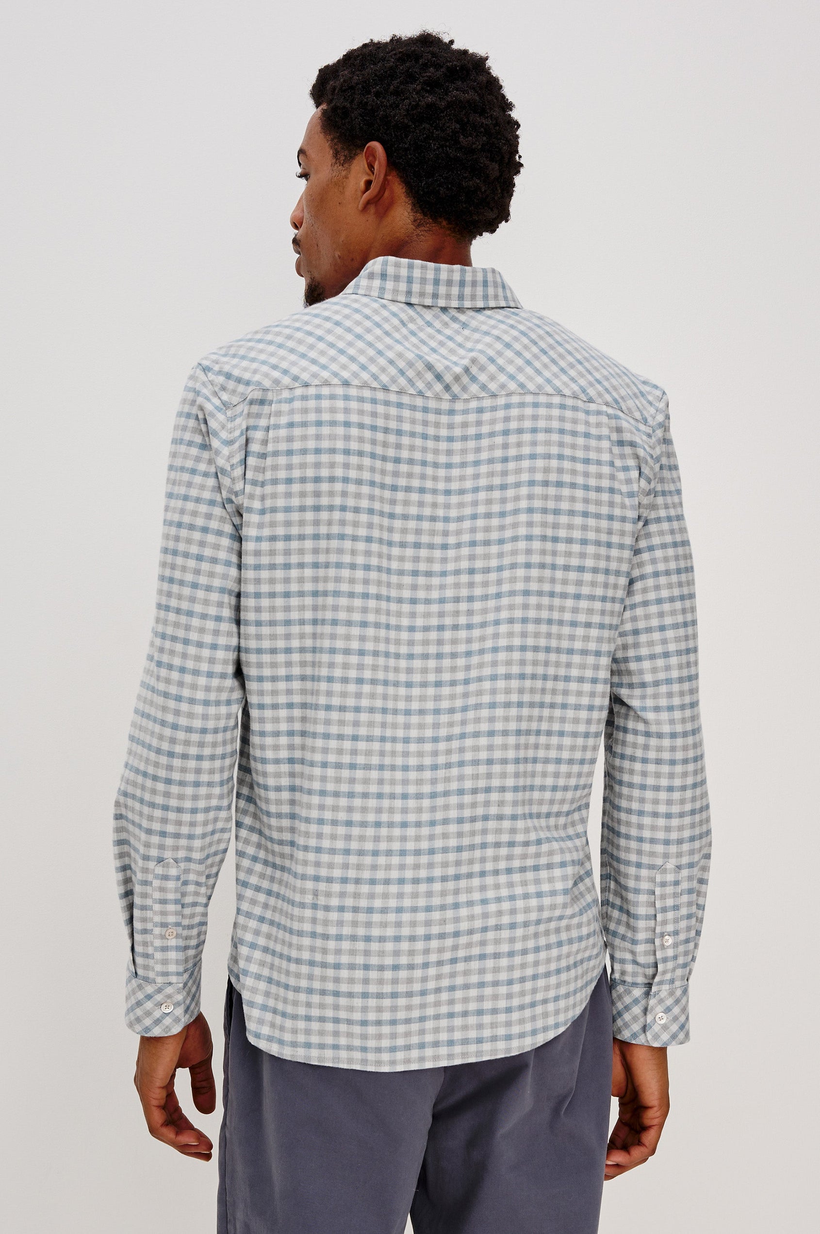 Vance button front collared shirt with long sleeves, collard stand buttons and a single chest pocket in Charcoal Blue Check colorway. Back view shown on model.
