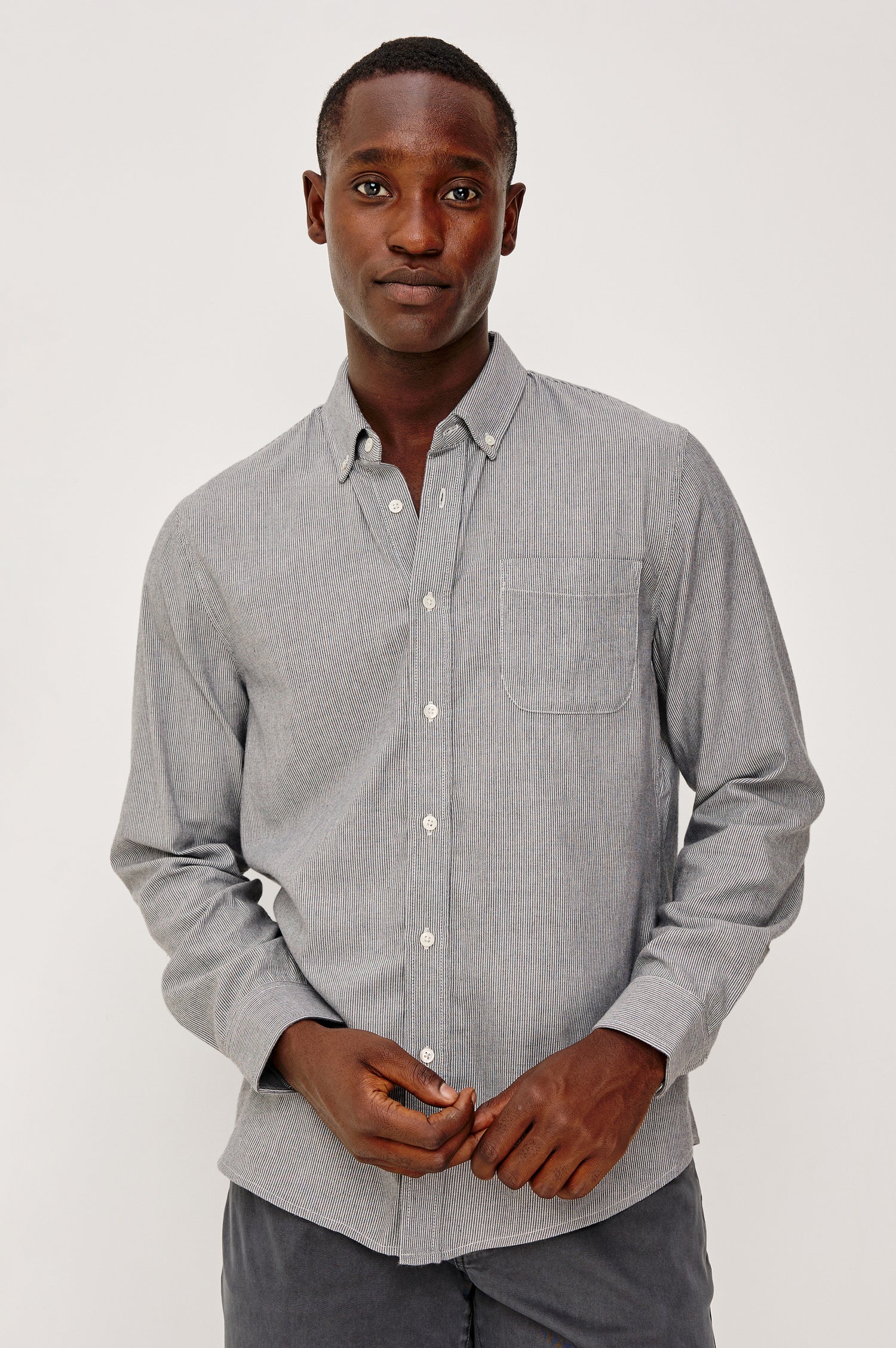 Vance Button Front Collared Shirt With Long Sleeves and Single Chest Pocket in Navy Rope Stripe Colorway - Upper Body Front View Featured on Model