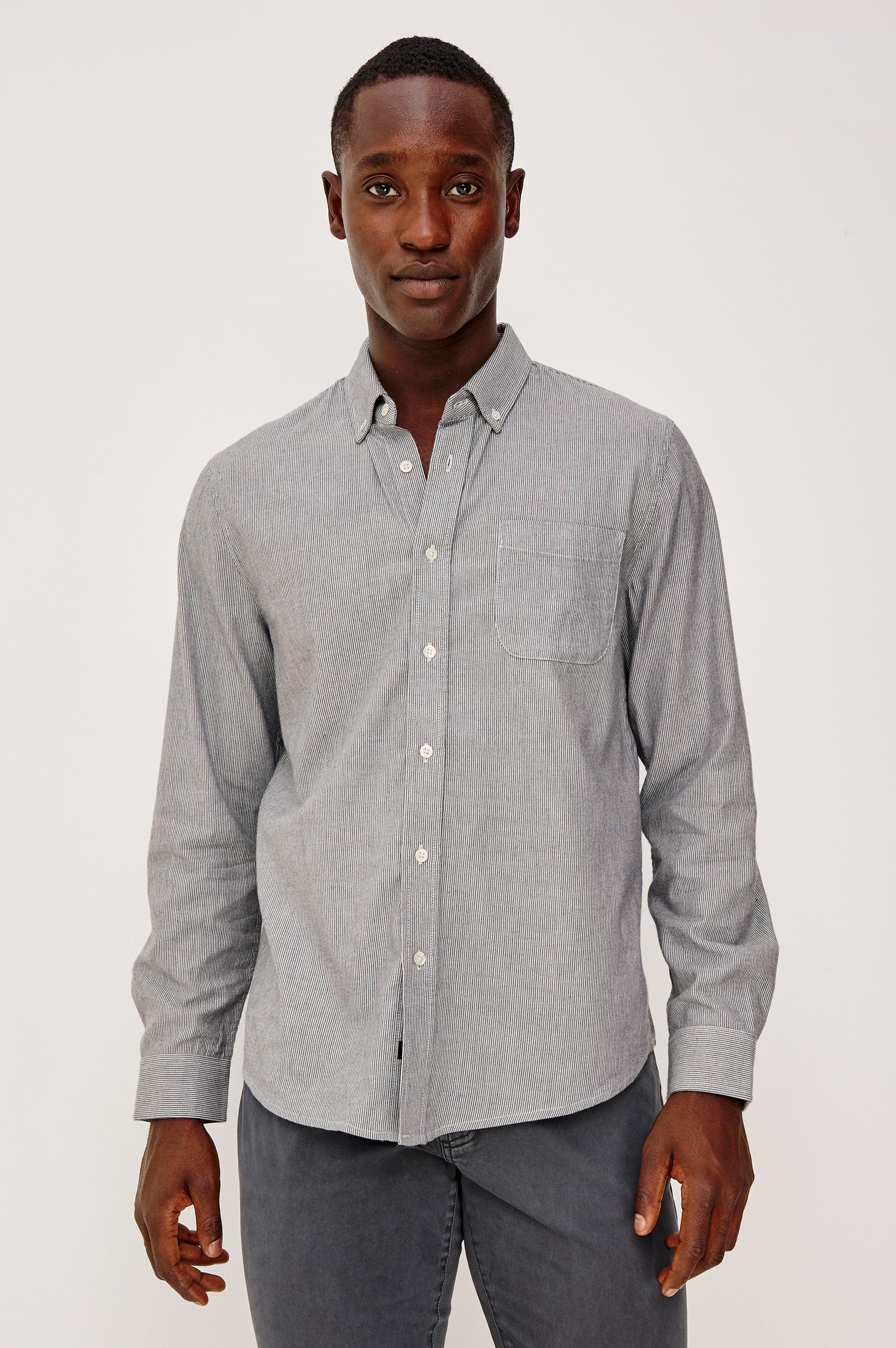 Vance Button Front Collared Shirt With Long Sleeves and Single Chest Pocket in Navy Rope Stripe Colorway - Upper Body Front View Featured on Model