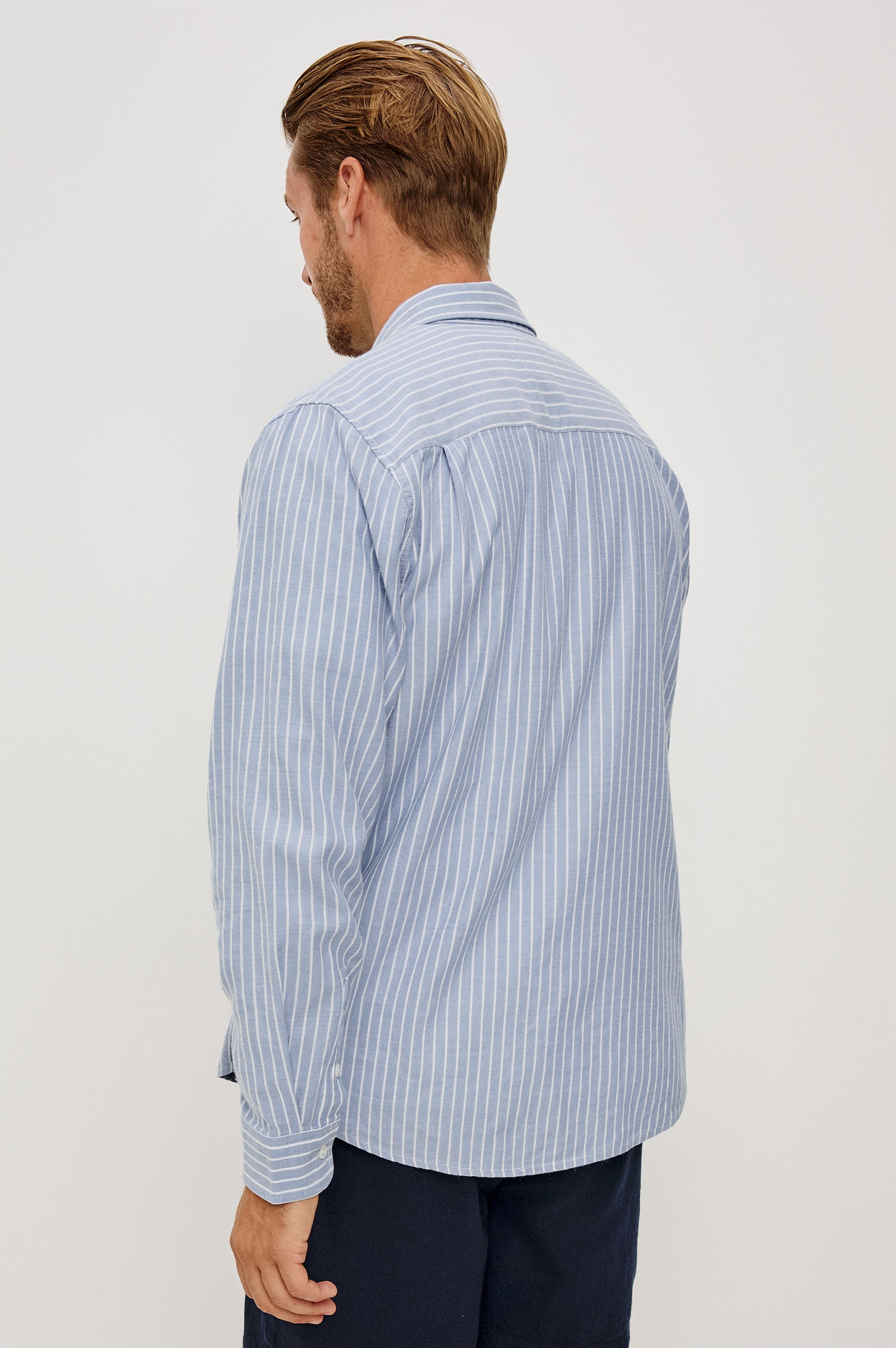 Vance Front Button Shirt in Cotton Blend With Collar, Long Sleeves, and Classic Fit in Oxford White Stripe Colorway - Upper Body Back View Featured on Model